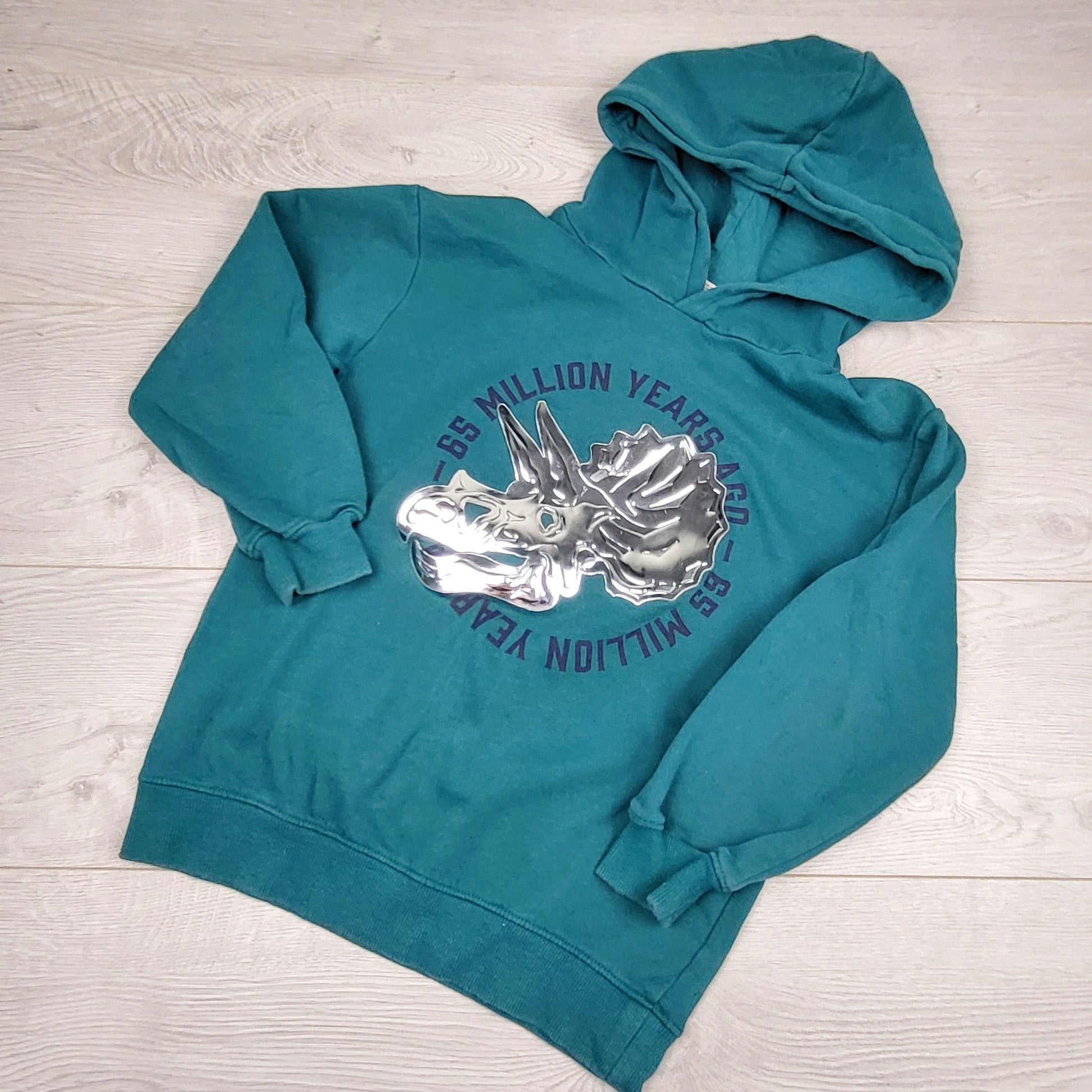 PS3 - Sweat à capuche doublé polaire bleu sarcelle H&M avec dinosaure métallisé. Taille 8-10 ans.