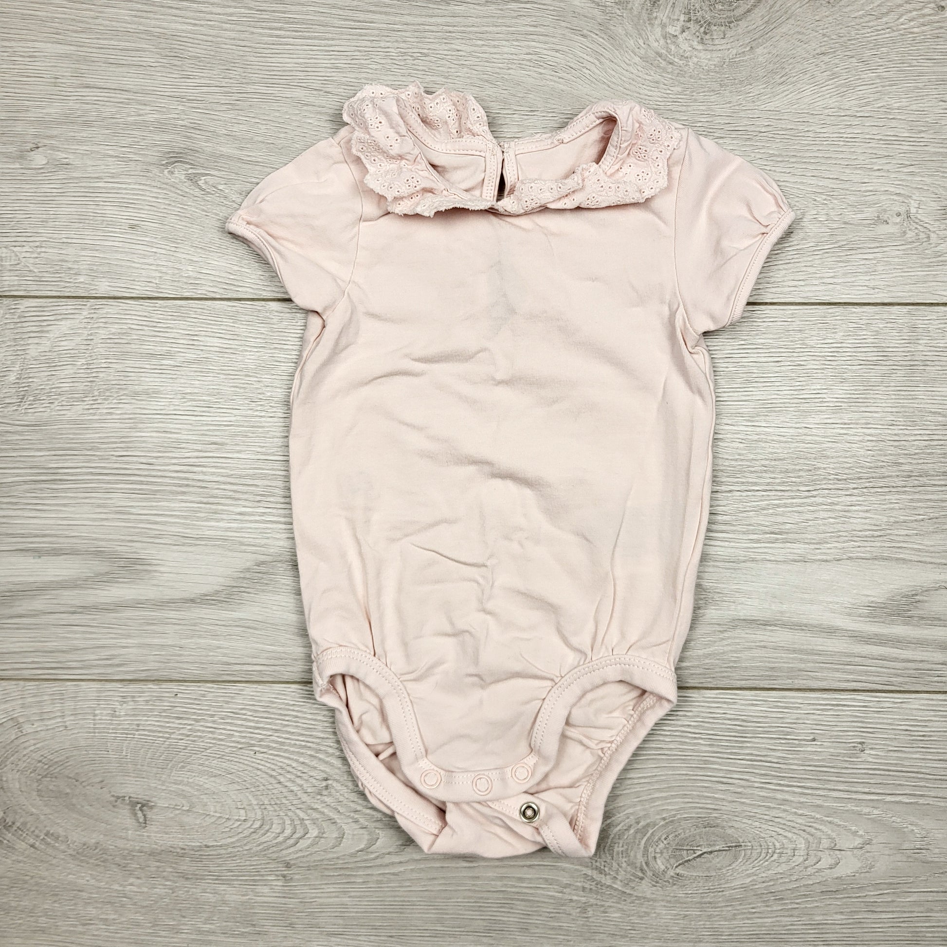 ECRS11 - H and M pink bodysuit with eyelet collar. Size 4-6 months