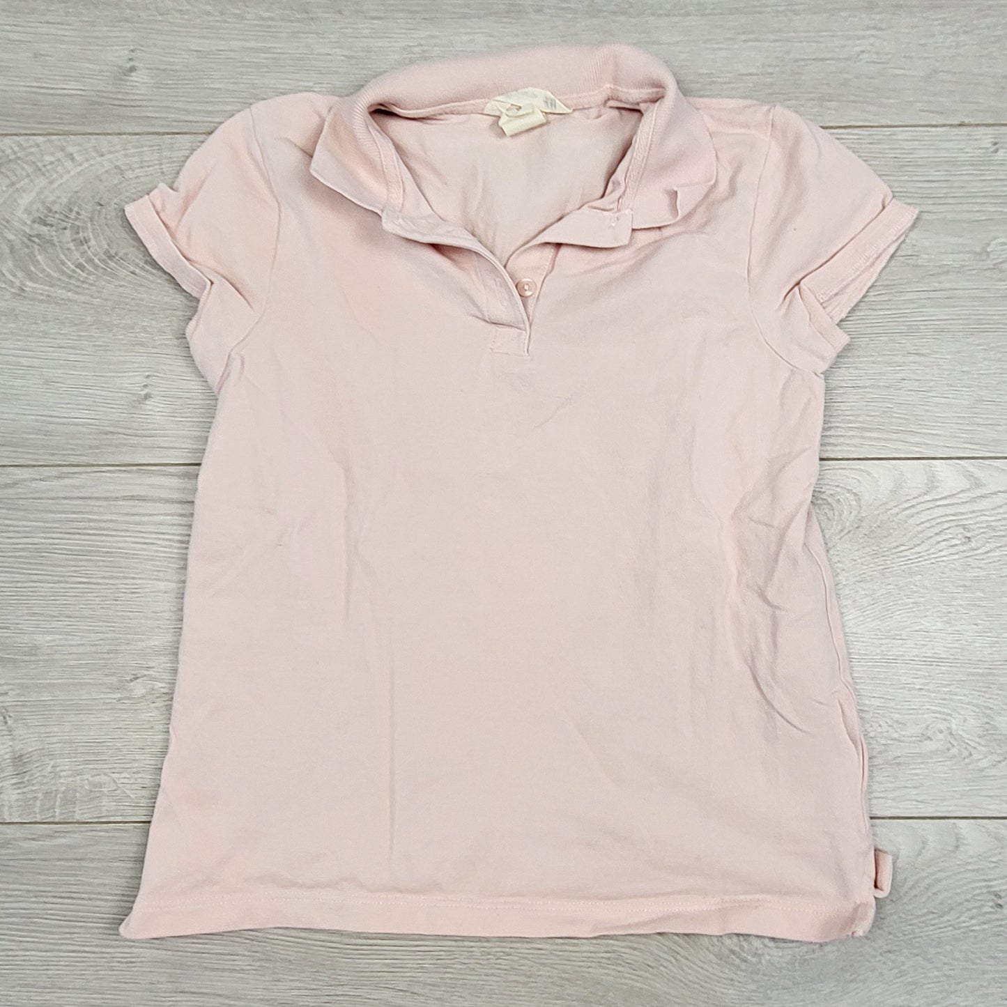 SHRSS22 - H and M pink polo shirt. Size 8-10 years