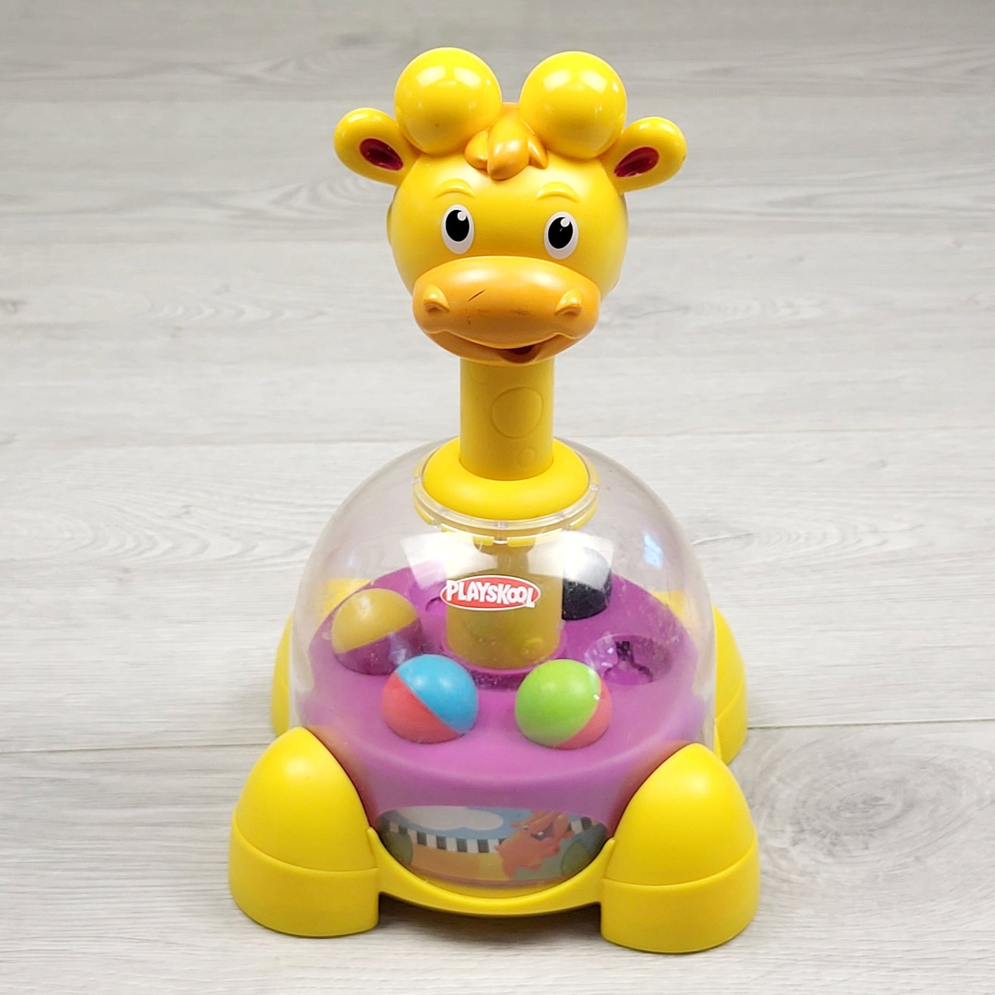 SPLT1 - Playskool giraffe ball popper toy