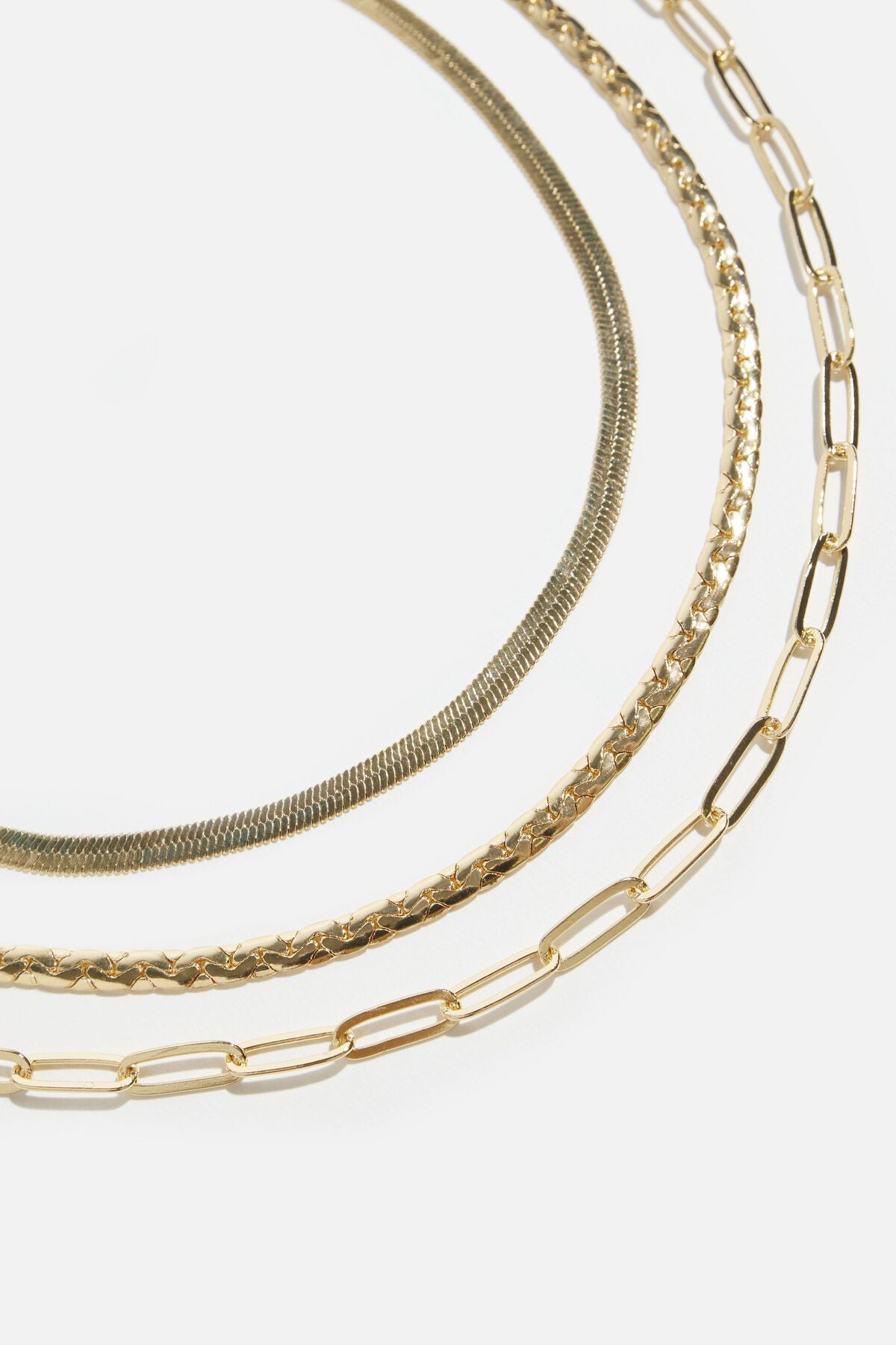 Collier à plusieurs niveaux avec trombone, serpent et chaîne plate