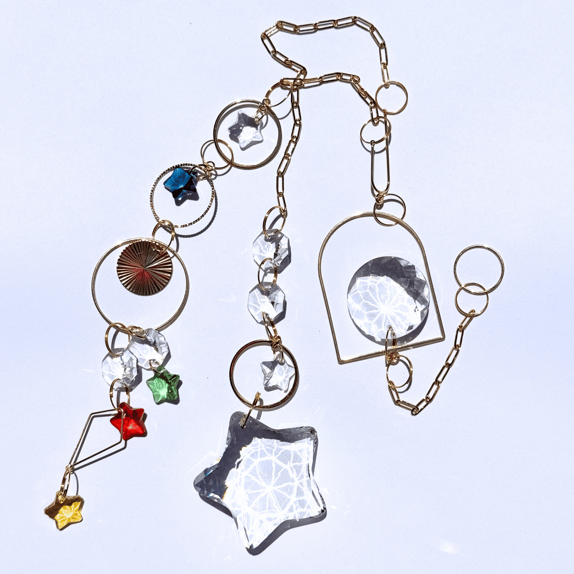 Capteur de soleil prisme en forme d'étoile filante