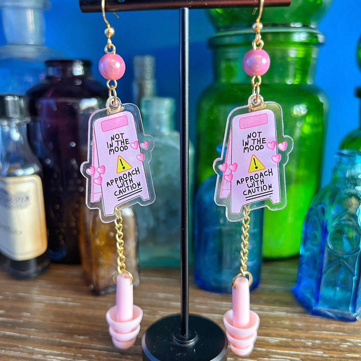 "Not in the Mood" Pink Caution Sign Earplug Earrings – Bold, Playful, and Sensory-Smart