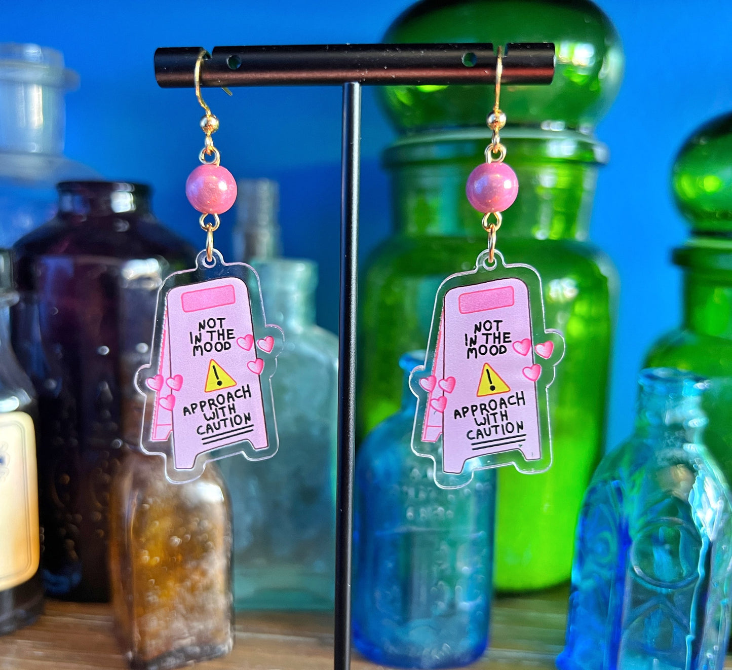 "Not in the Mood" Pink Caution Sign Earplug Earrings – Bold, Playful, and Sensory-Smart