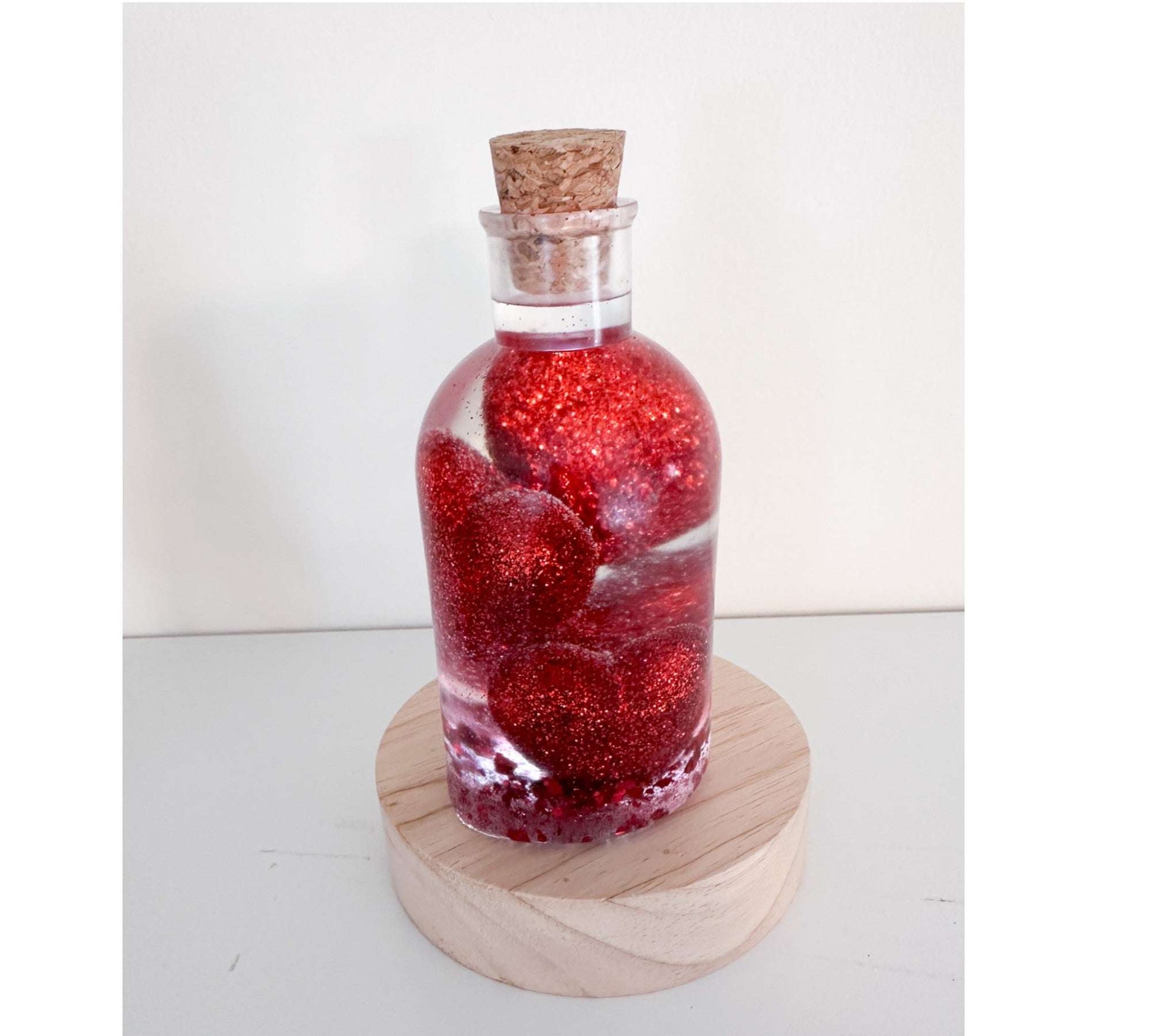 Bouteille en résine Love Potion - Décoration d'intérieur en forme de cœur scintillant faite à la main
