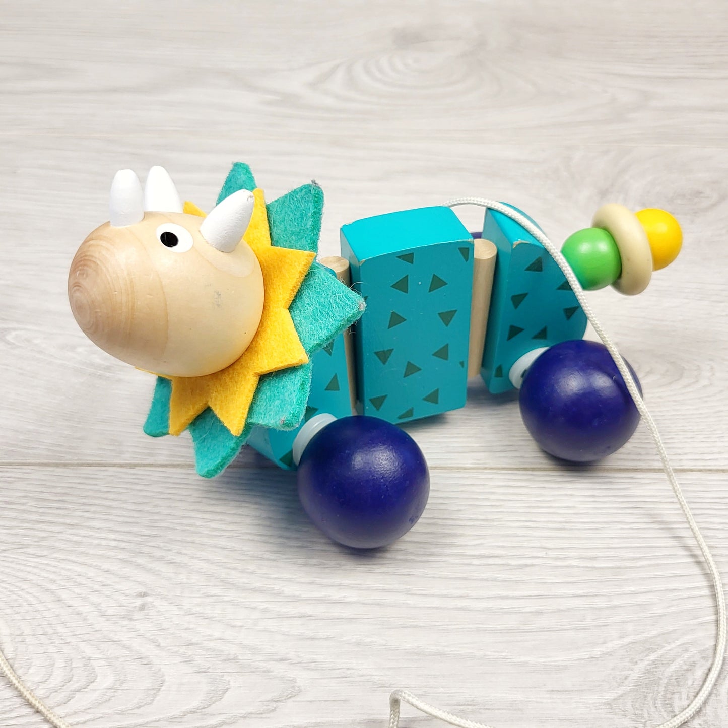 CHLV3 - Wooden pull along dino toy