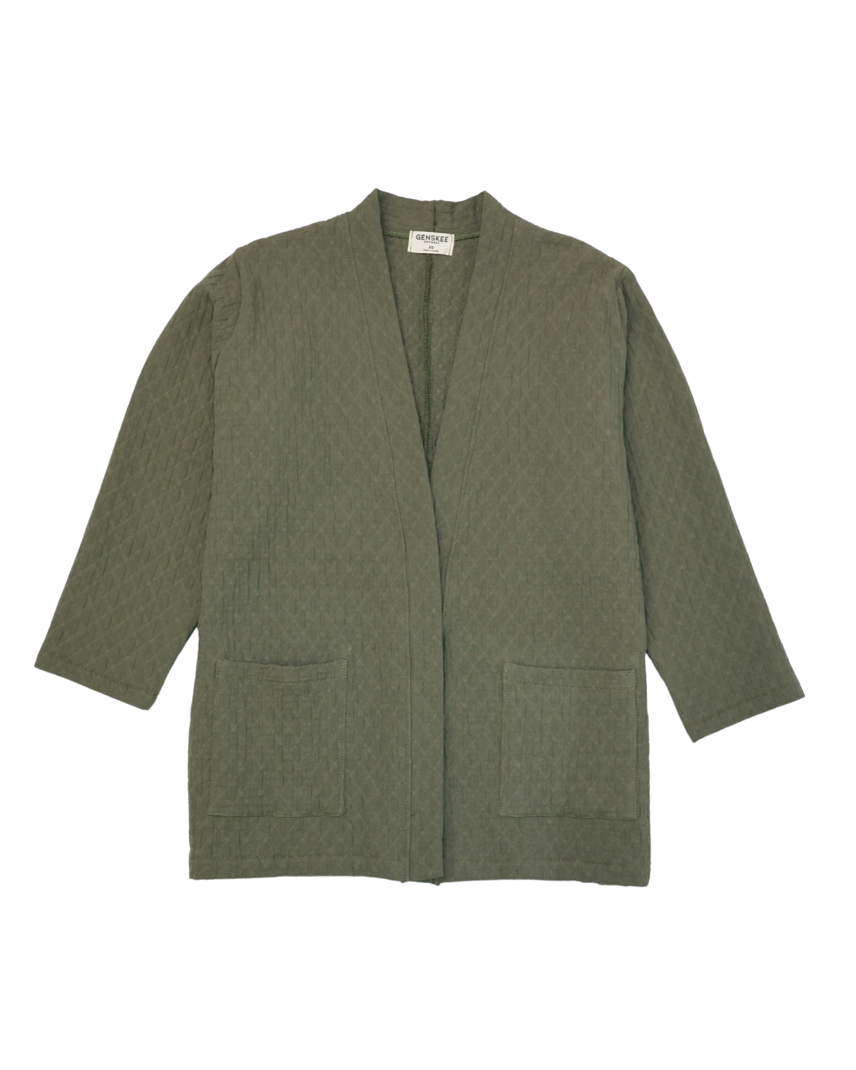 Le cardigan matelassé en coton biologique vert