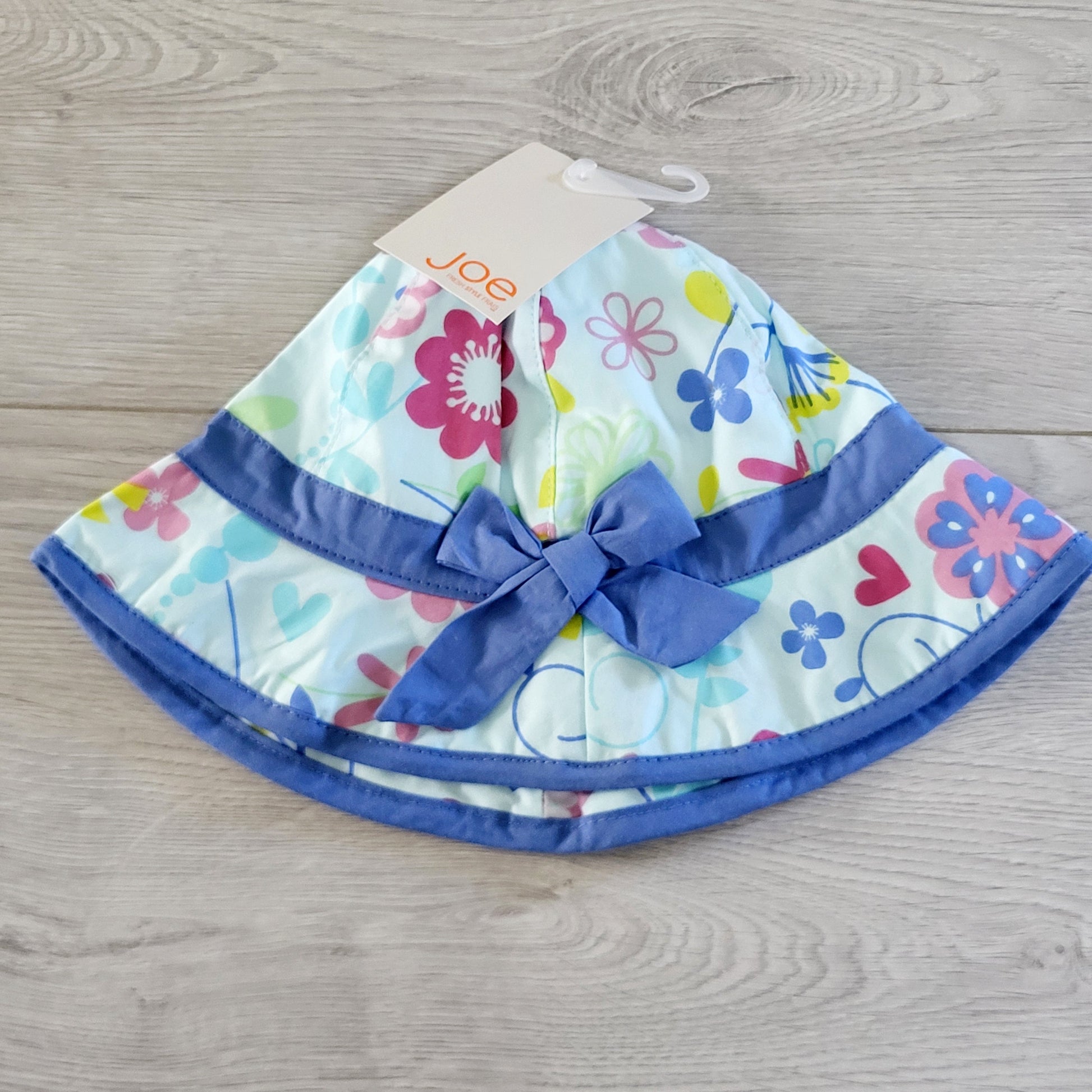 SUSM1 - NOUVEAU - Bob Joe bleu à imprimé floral. Taille 0-12 mois