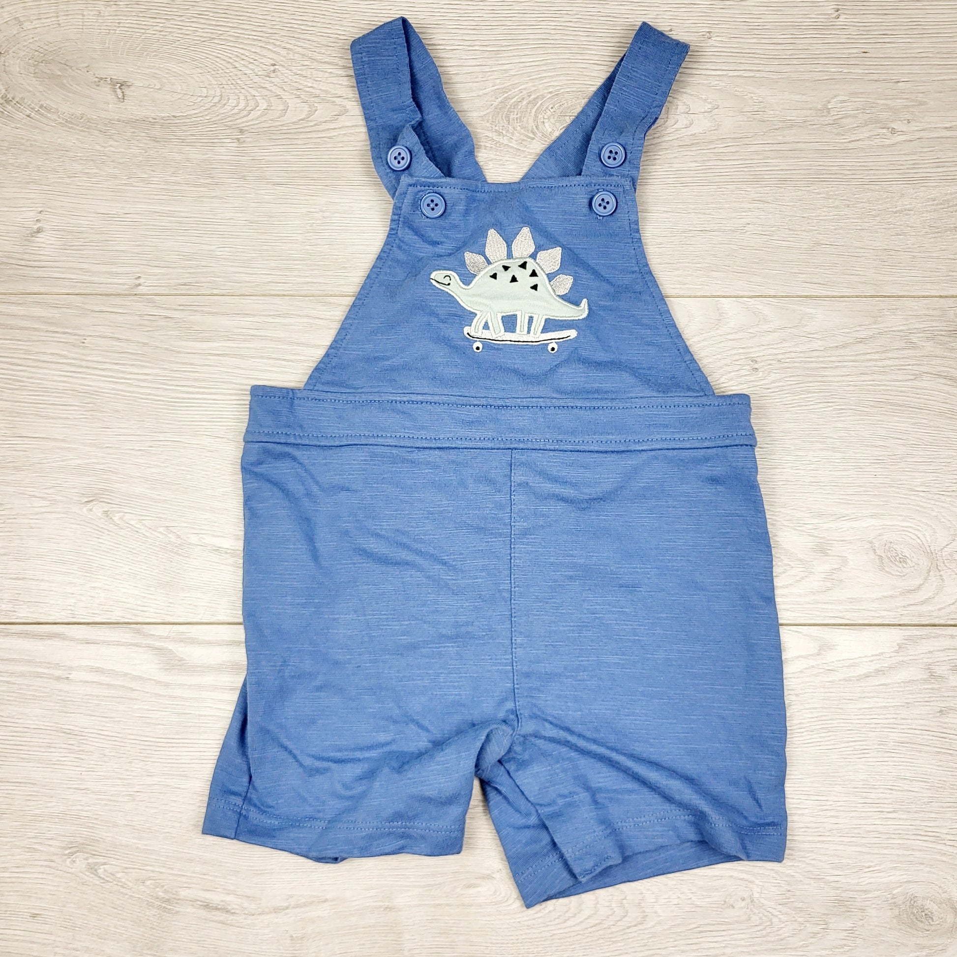 TBOW2 - Salopette courte Pekkle en coton bleu avec motif dinosaure. Taille 24 mois