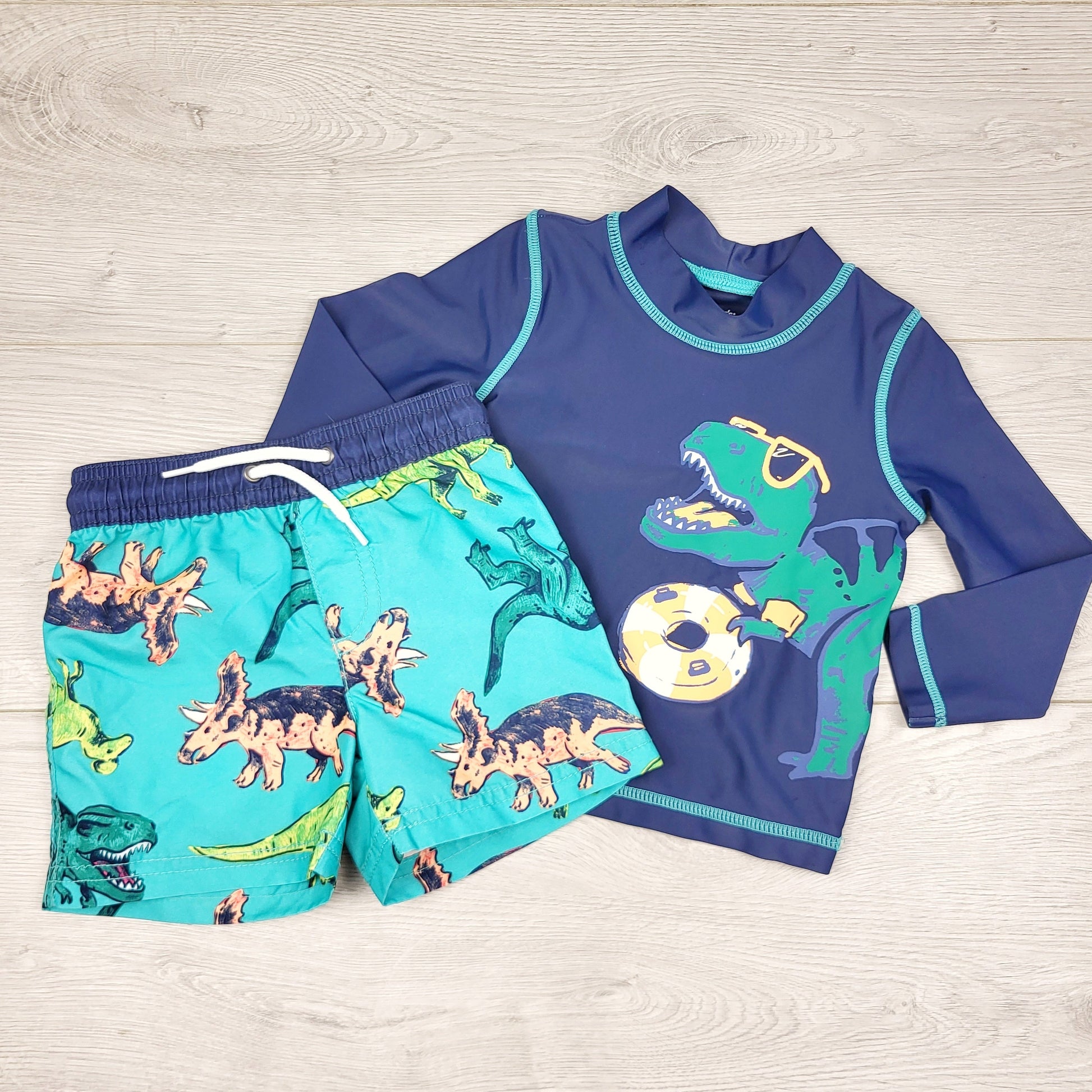 TBOW2 - Maillot de bain 2 pièces Carters bleu marine et turquoise avec dinosaures. Taille 9 mois
