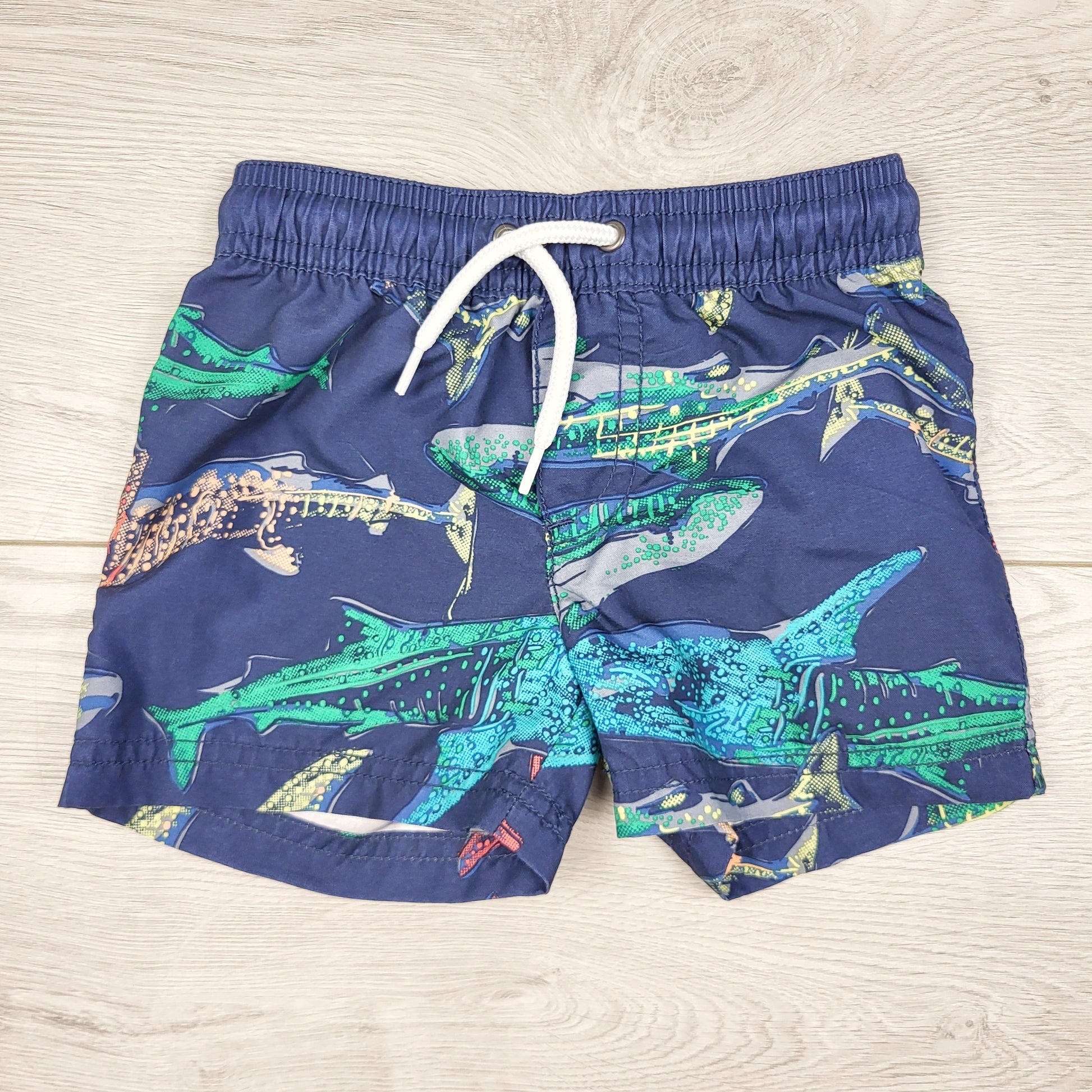 TBOW2 - Short de bain Carters bleu marine à motif requins. Taille 9 mois