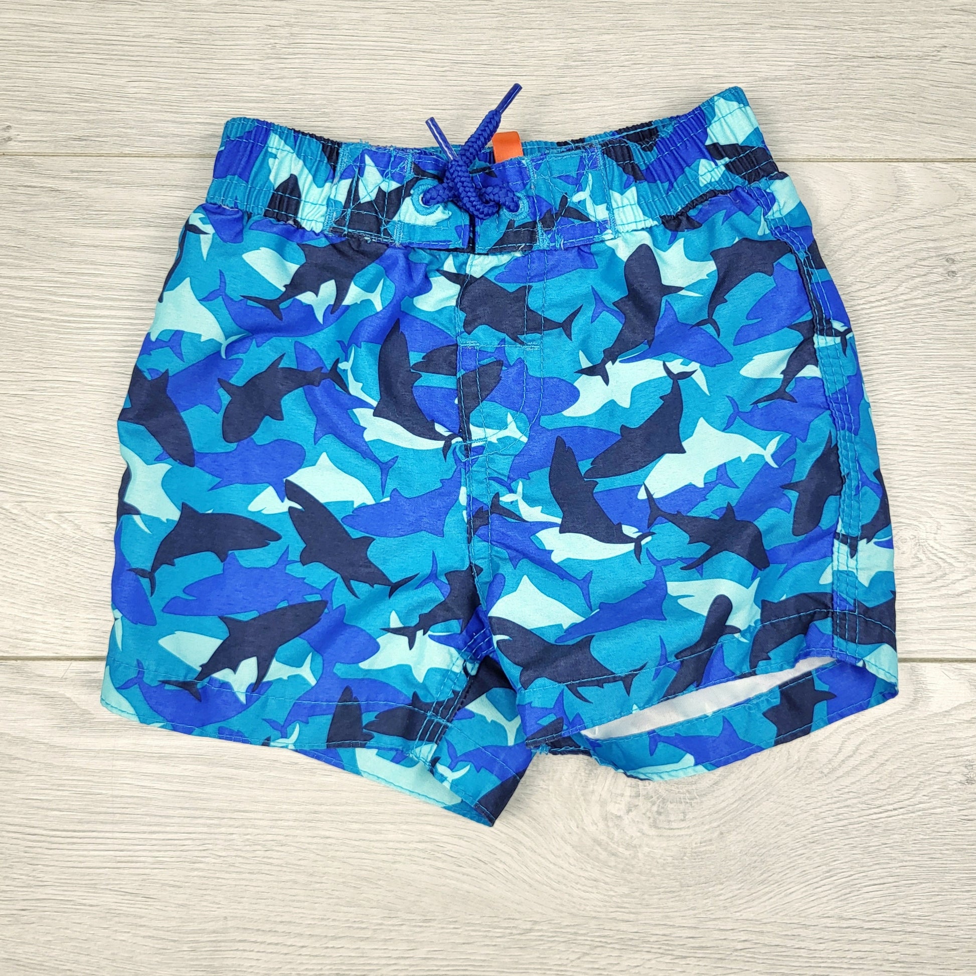 TBOW2 - Short de bain Joe bleu à motif requins. Taille 6-12 mois
