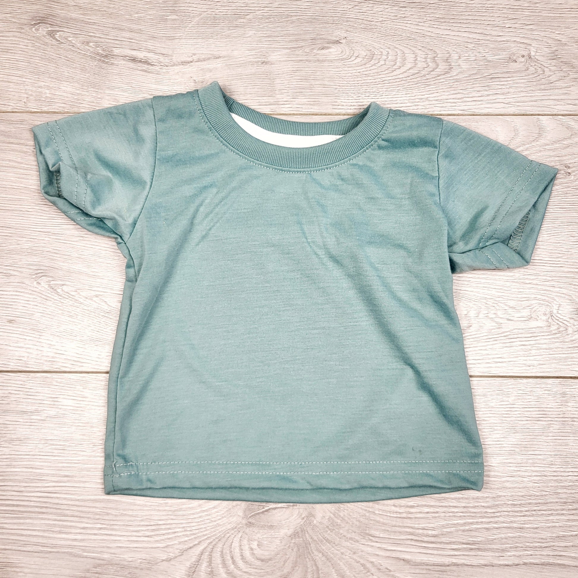 CKFT1 - T-shirt bébé bleu sarcelle Blanks. Taille 6-12 mois.