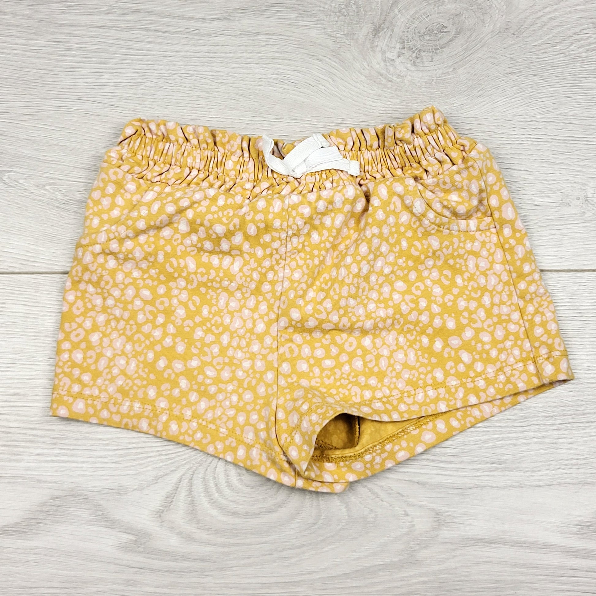 RUBH1 - Short en coton à motifs jaune et rose. Taille 18 mois