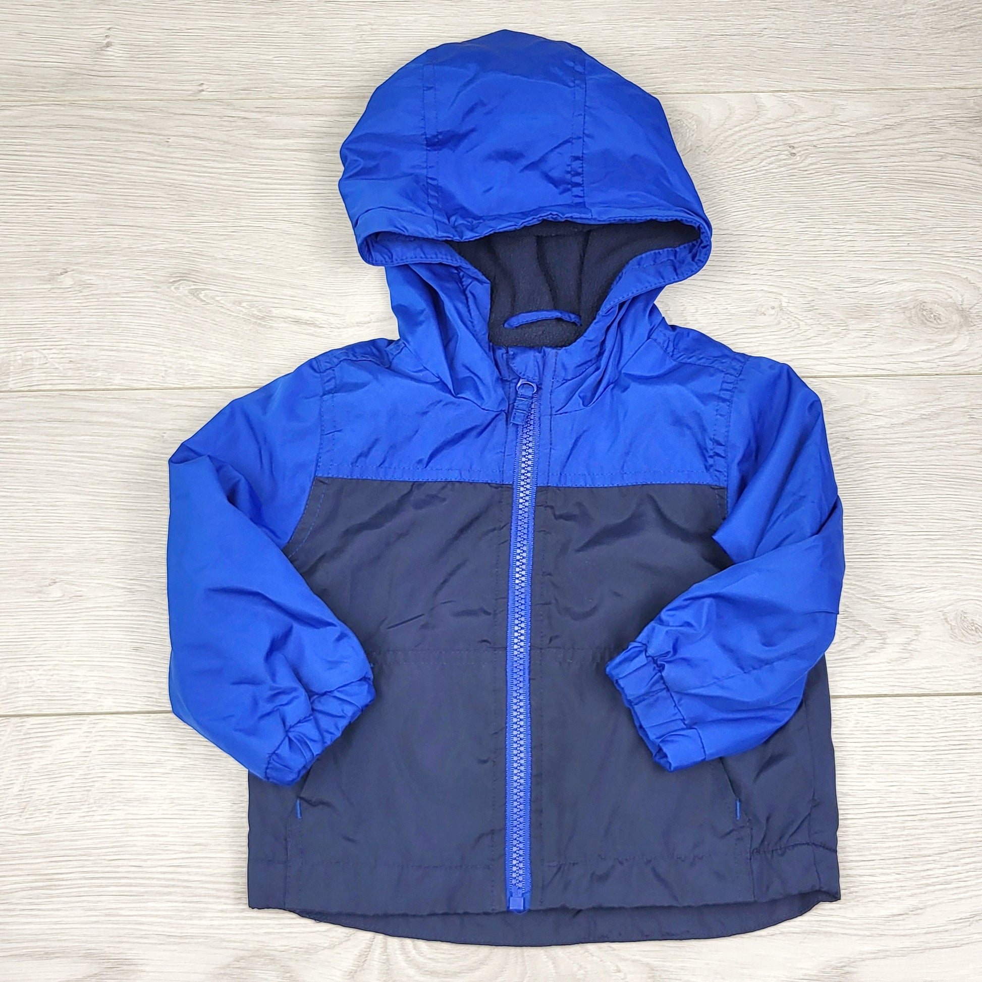 RUBH2 - Veste à capuche doublée polaire bicolore bleue George. Taille 12-18 mois