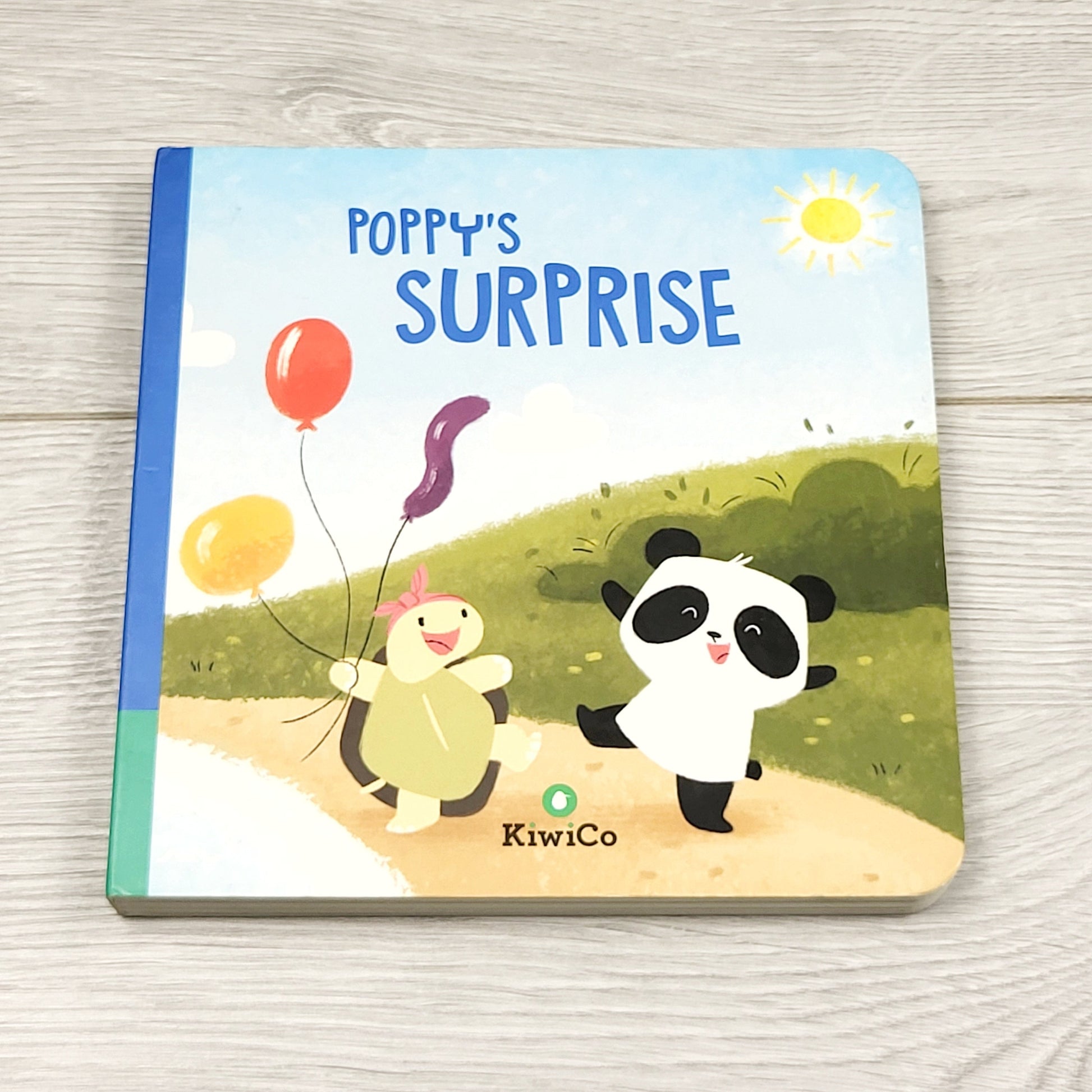 CSMP1 - La Surprise de Poppy. Livre cartonné