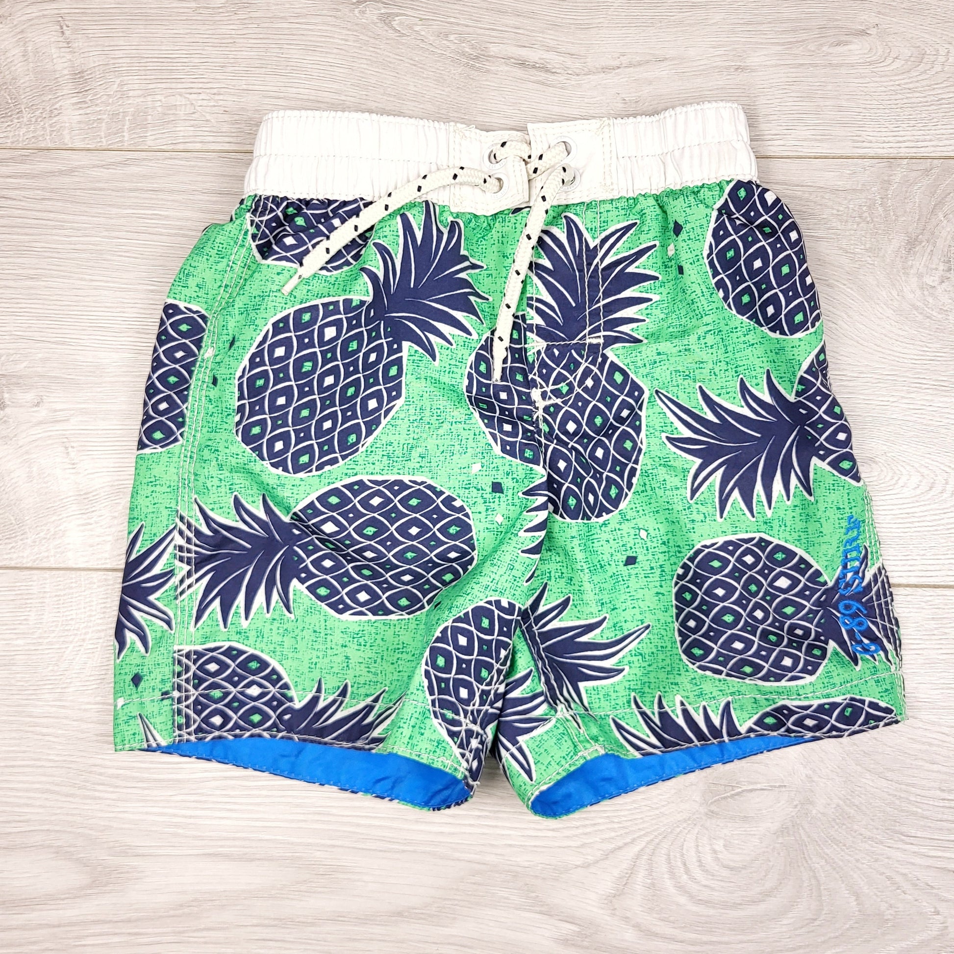 KLJ1 - Short de bain ananas Gap. Taille 3T