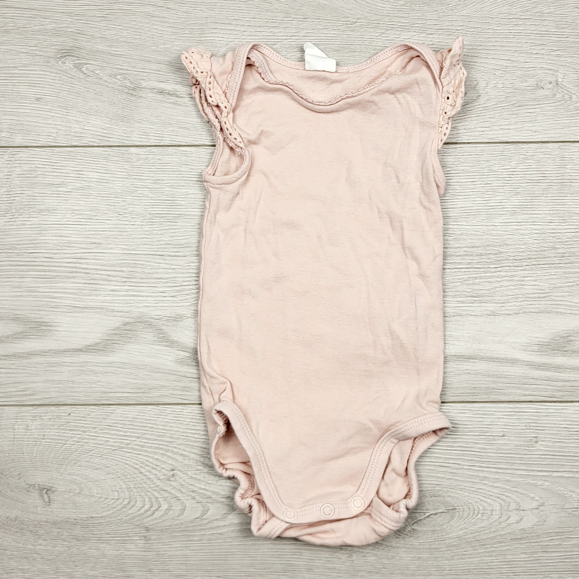 ECRS1 - Body rose H&amp;M avec manches à œillets. Taille 4-6 mois.