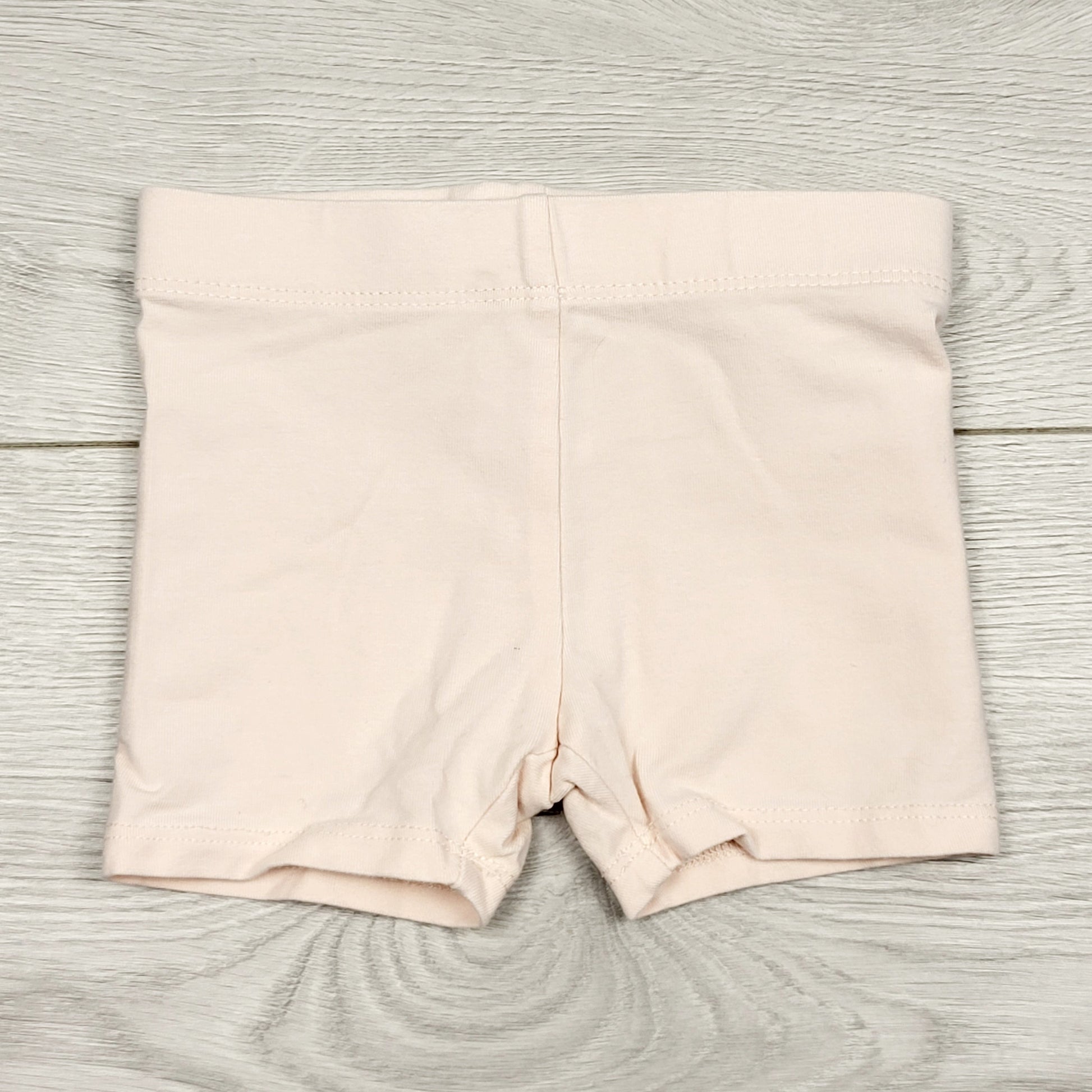 ECRS1 - Short cycliste rose pâle. Taille 12 mois