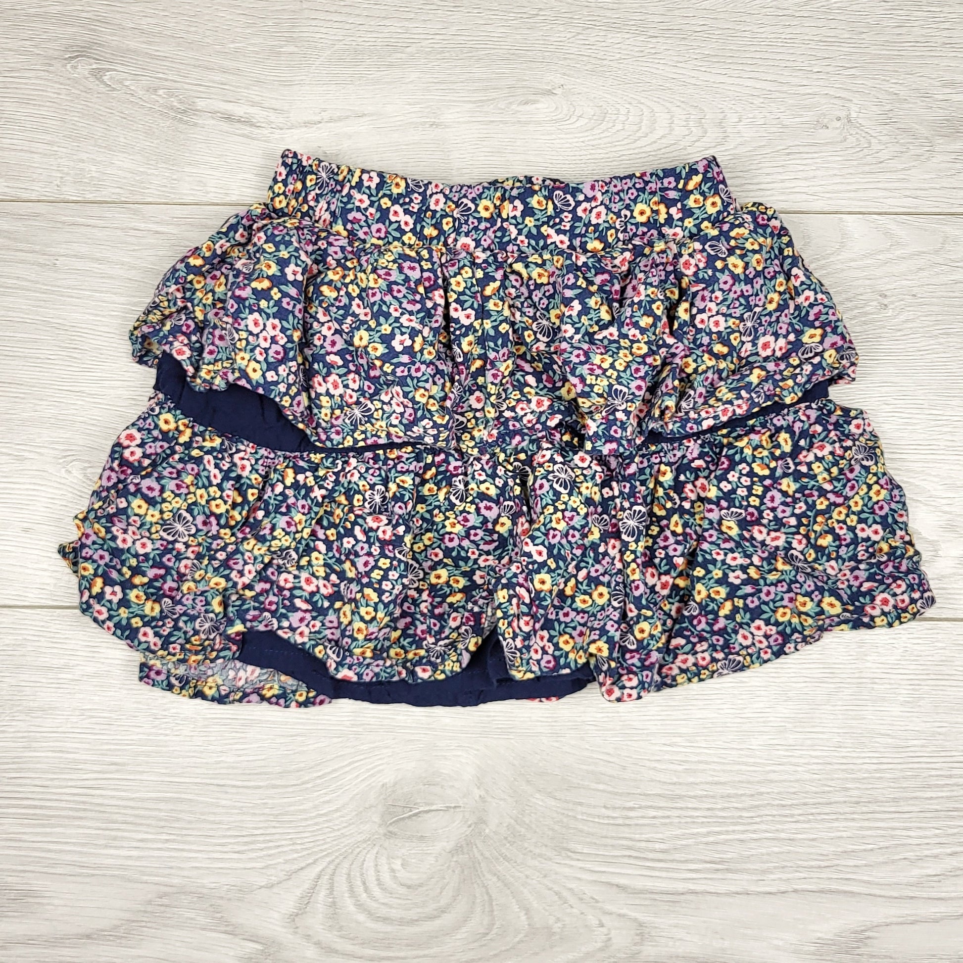 LKAN1 - Jupe à volants Garanimals bleu marine à imprimé floral. Taille 4T