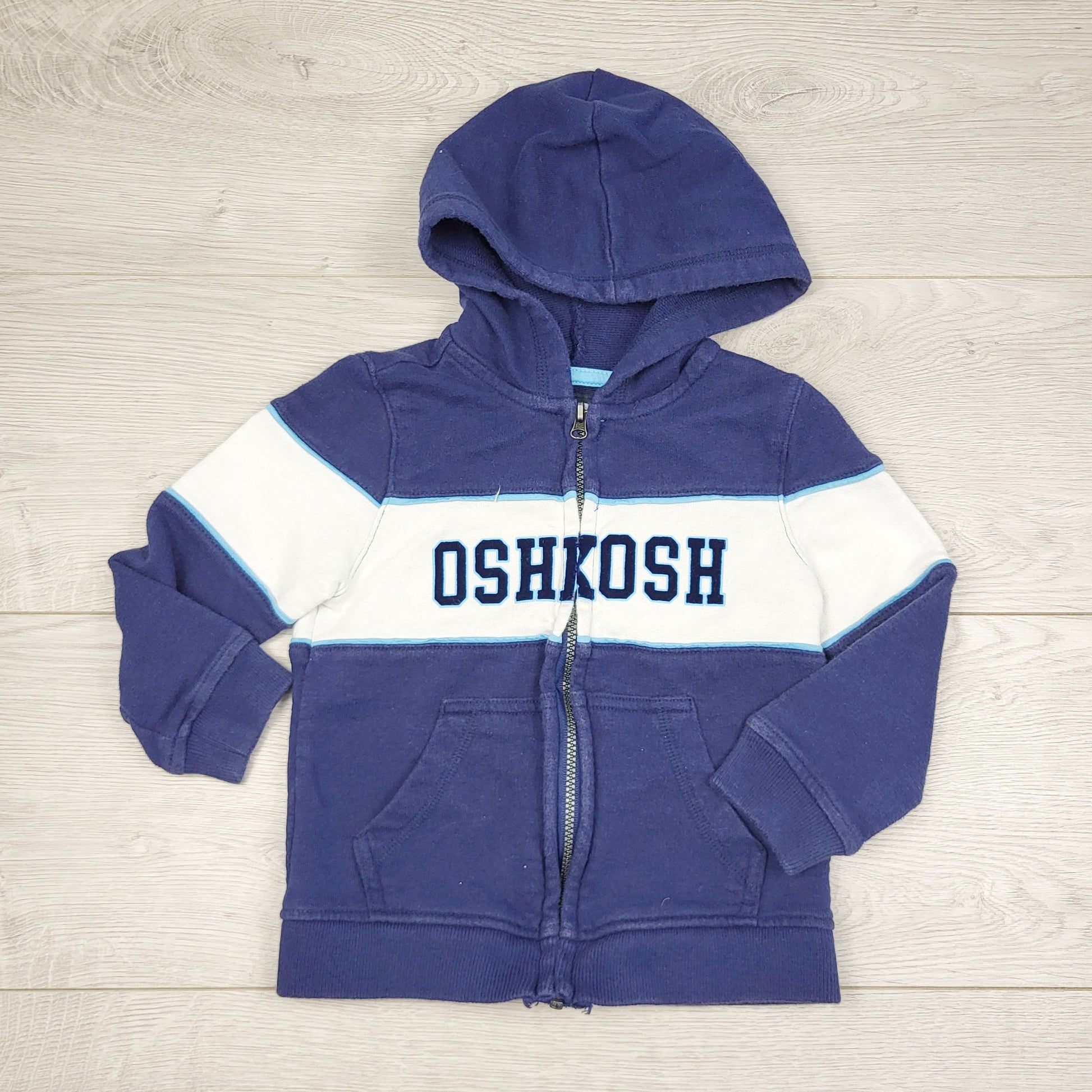 TBOW2 - Sweat à capuche zippé en coton à rayures bleu marine et blanches Oshkosh. Taille 24 mois.