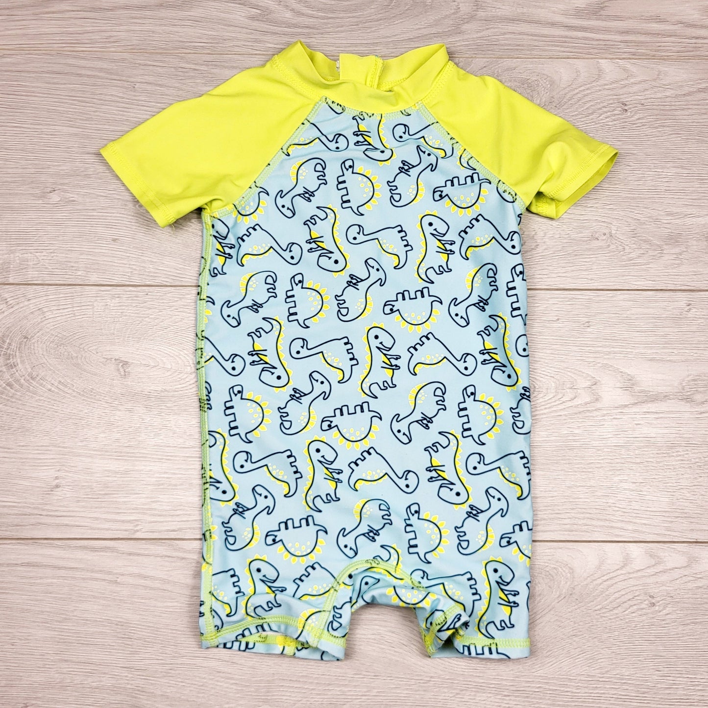 CHLV1 - Maillot de bain une pièce Floatimini motif dinosaures. Taille 18 mois.