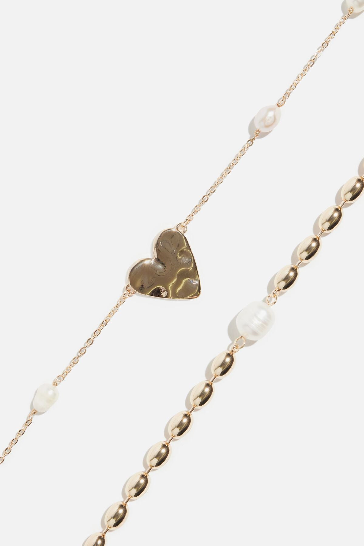 Ensemble de colliers de perles en forme de cœur