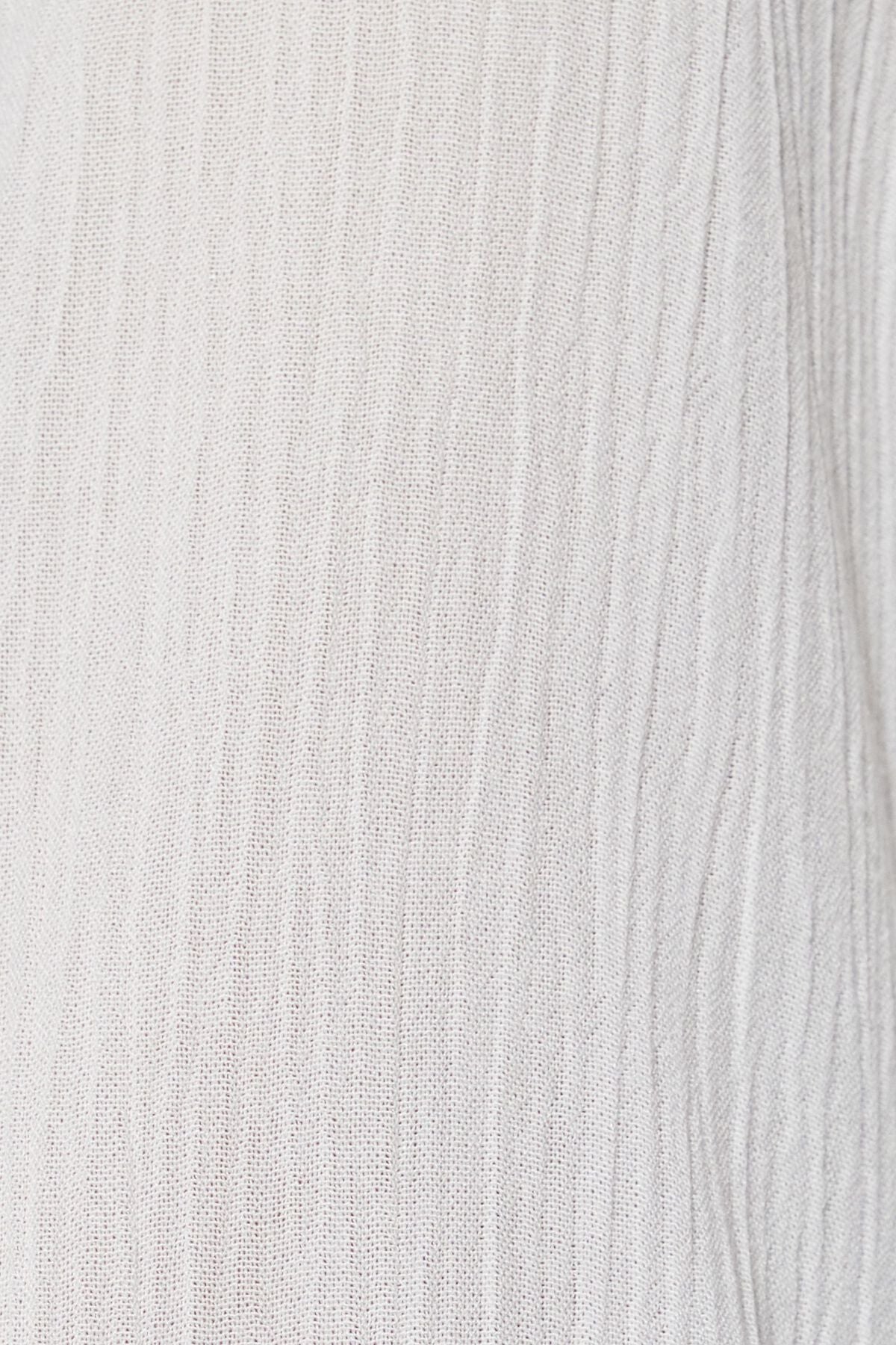 Haut micro-laitière à manches longues