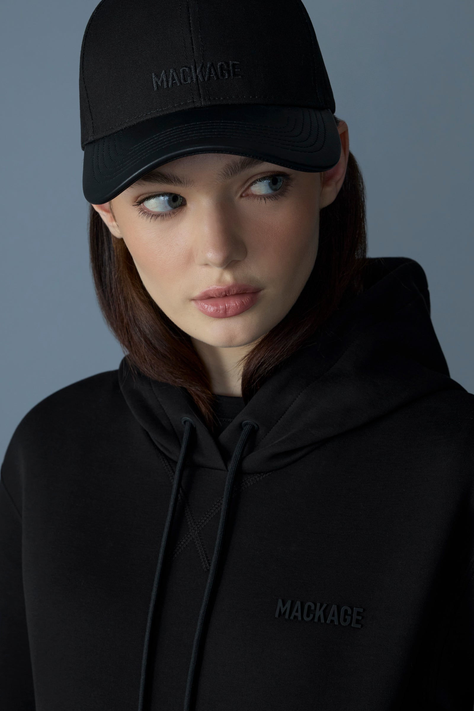 Casquette ANDERSON-NV en toile de coton avec bord en cuir