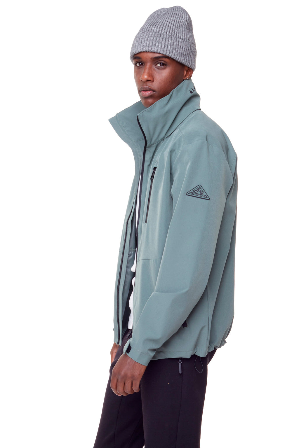 CARMACKS | VESTE DE PLUIE MOYENNE UNISEXE (RECYCLÉE), VERT POUDRÉ