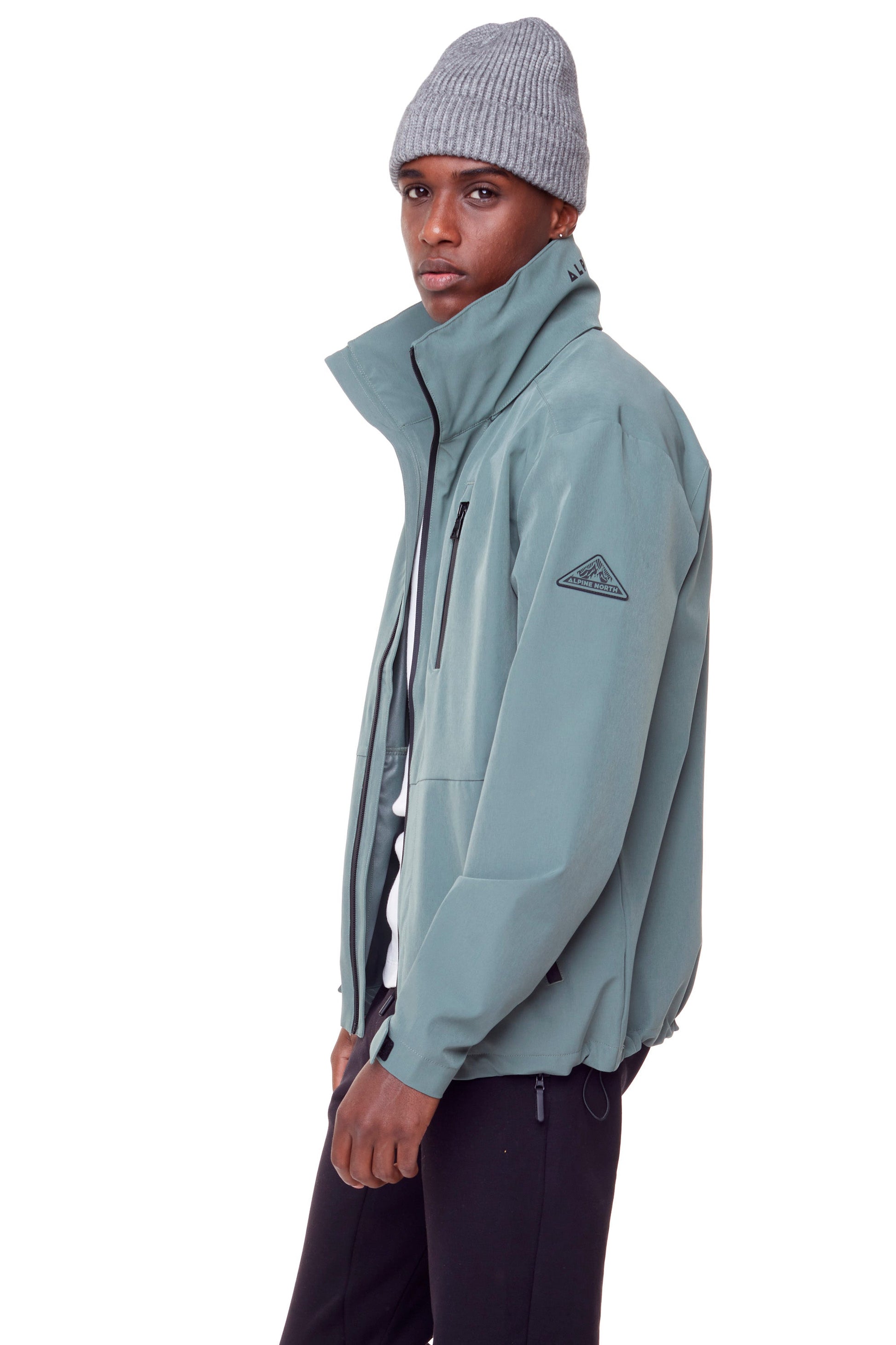 CARMACKS | VESTE DE PLUIE MOYENNE UNISEXE (RECYCLÉE), VERT POUDRÉ