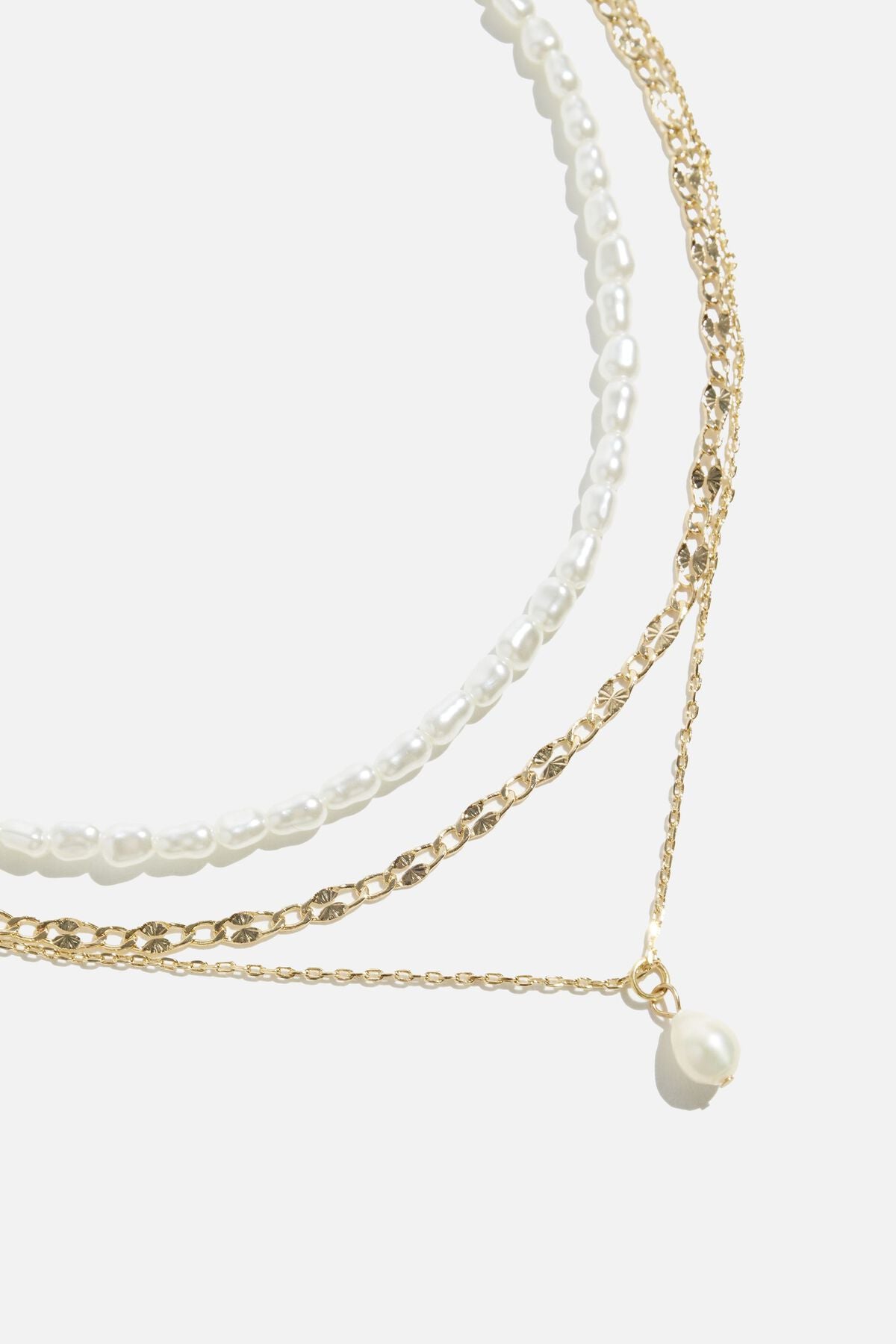 Collier superposé de perles et de chaînes