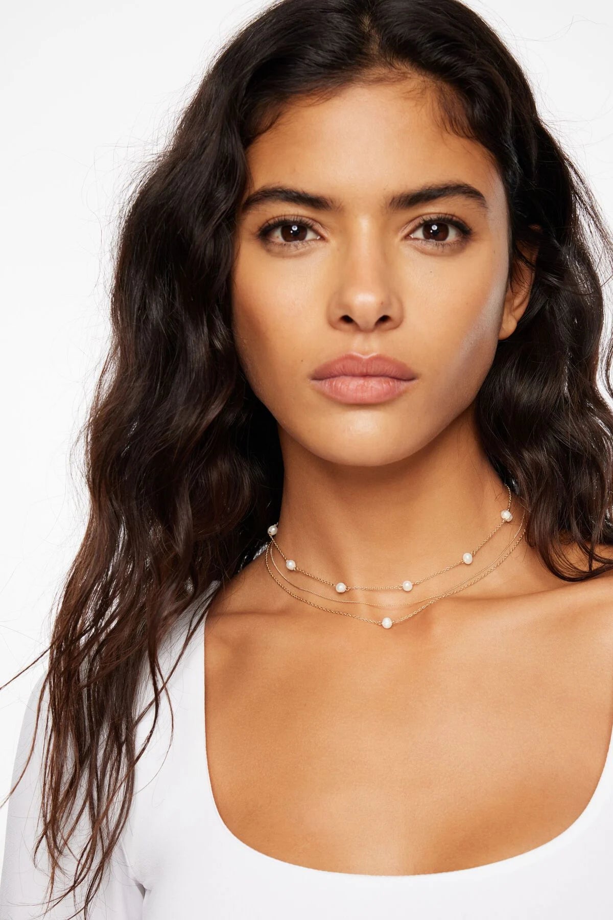 Collier de perles délicates superposées
