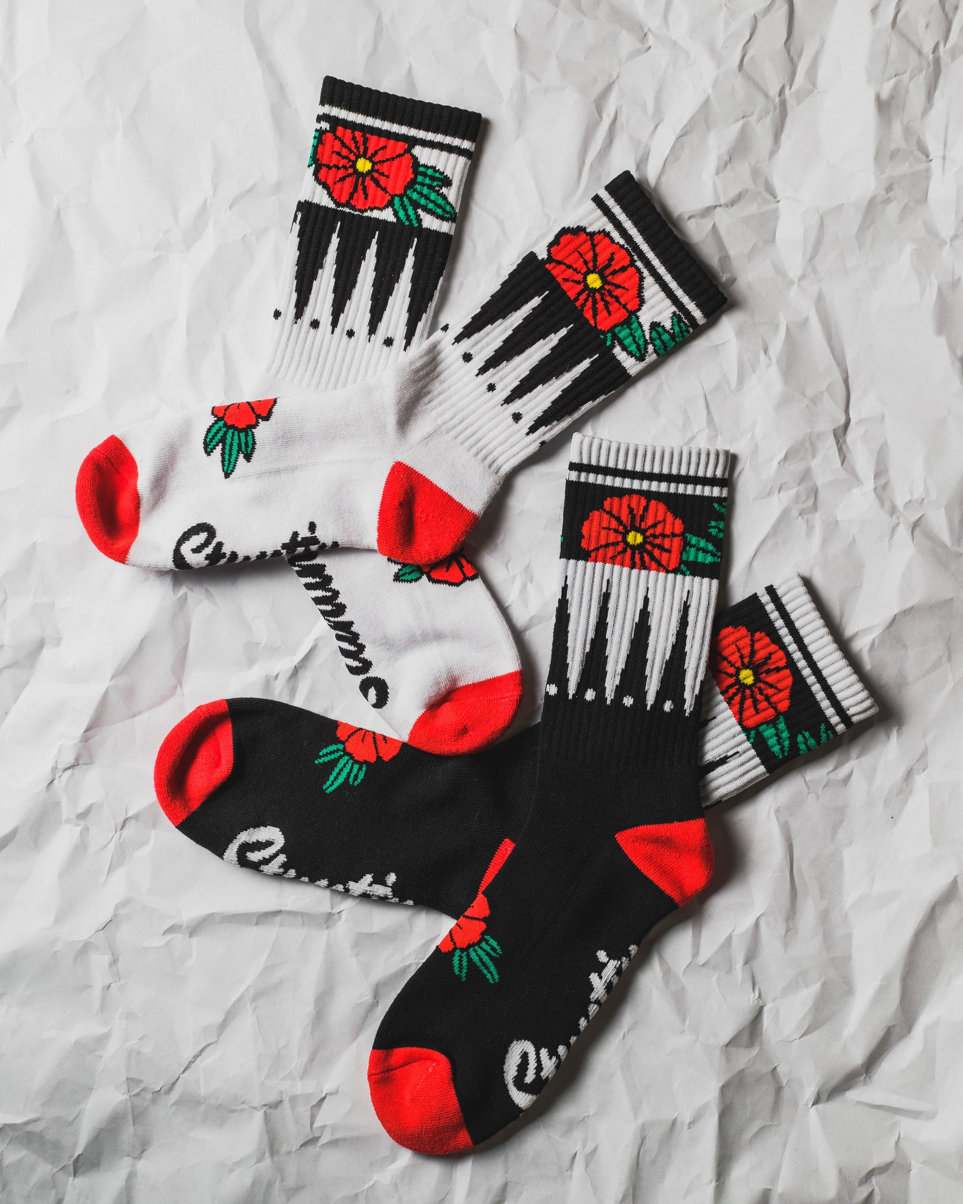 Chaussettes noires à fleurs géométriques
