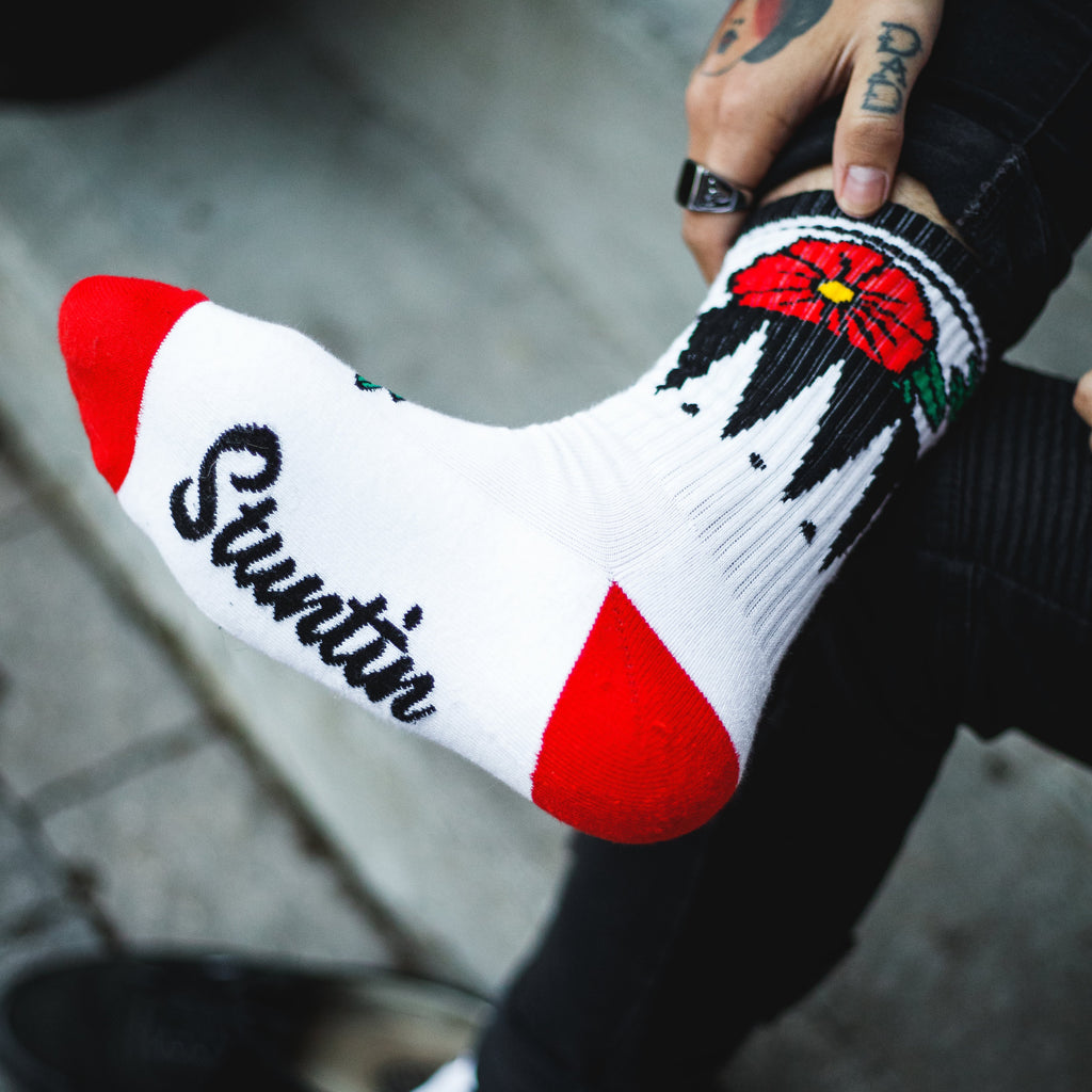 Chaussettes blanches à fleurs géométriques