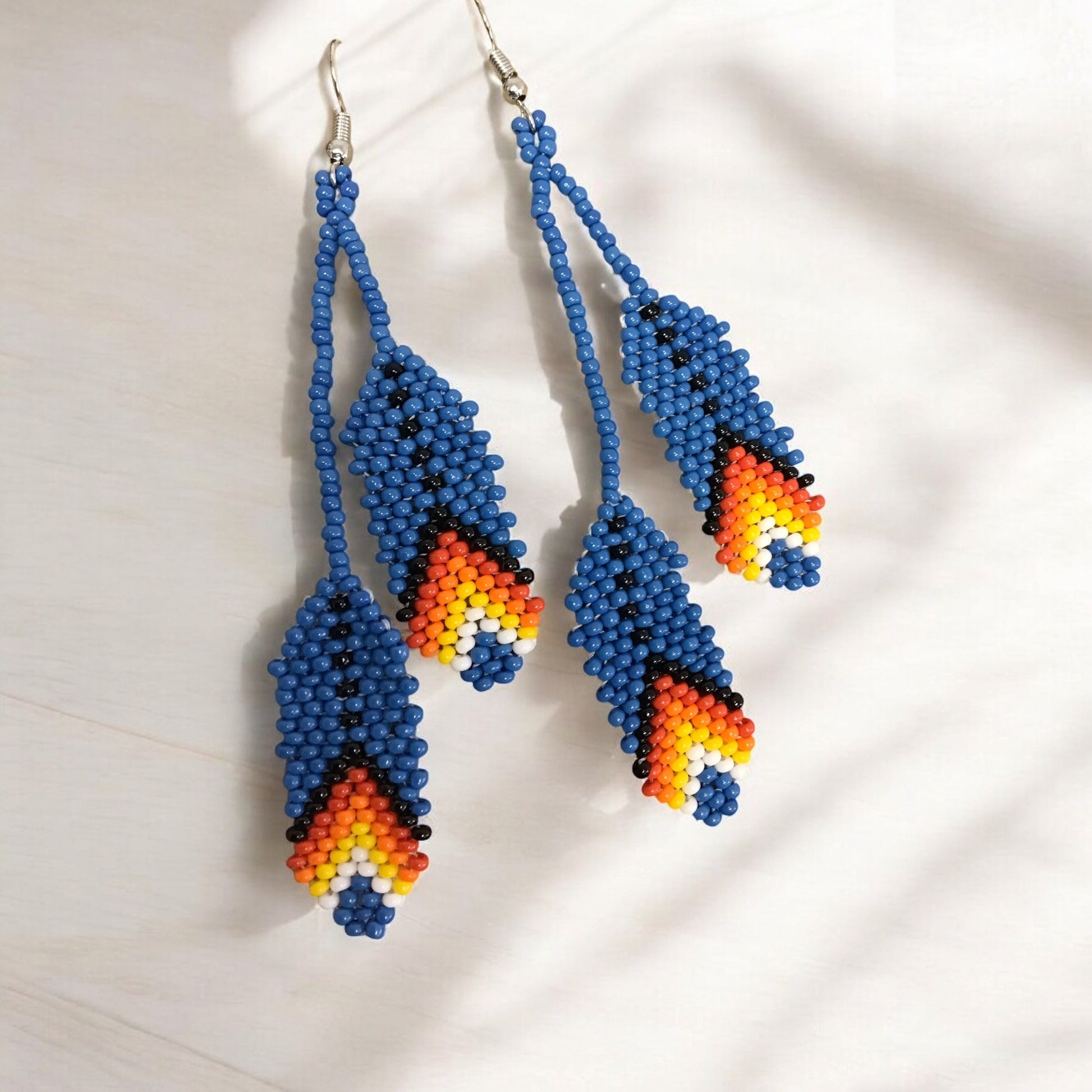 OldTribes™ dark blue beaded Feather earrings
