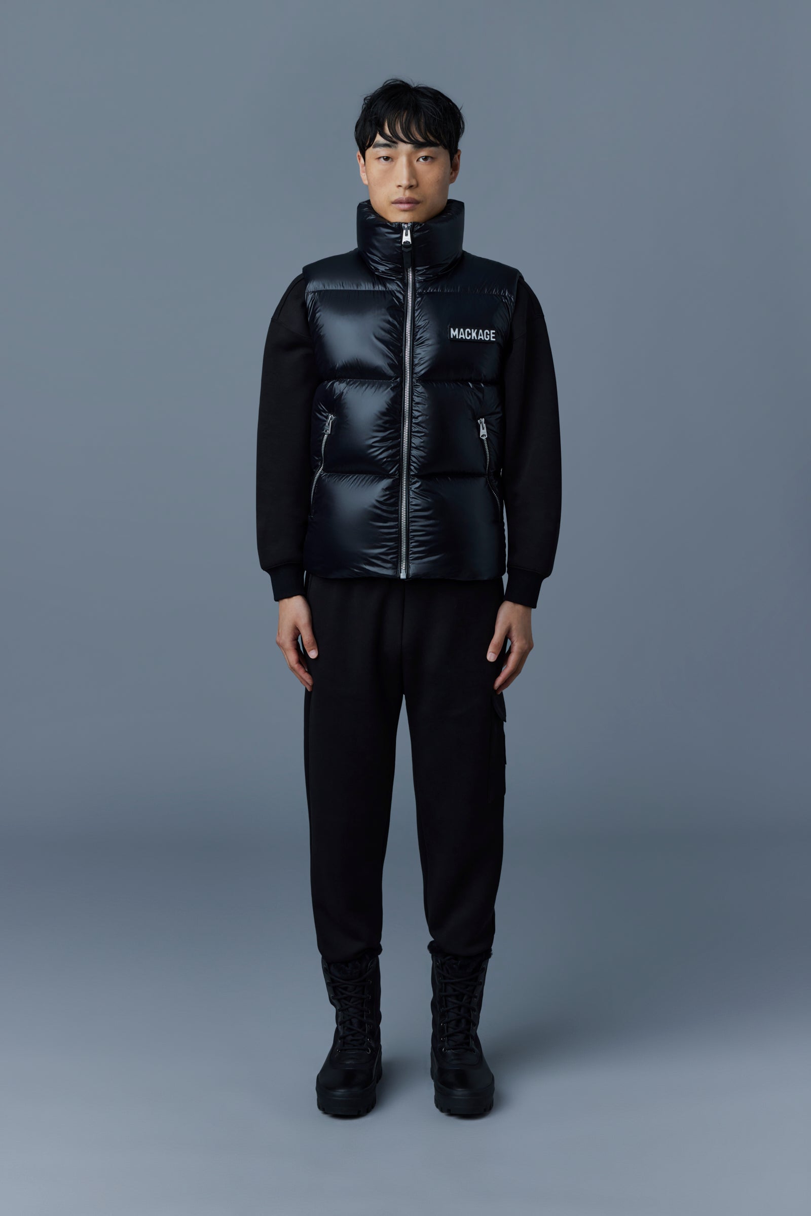 KANE lustrous light down vest with funnel collar