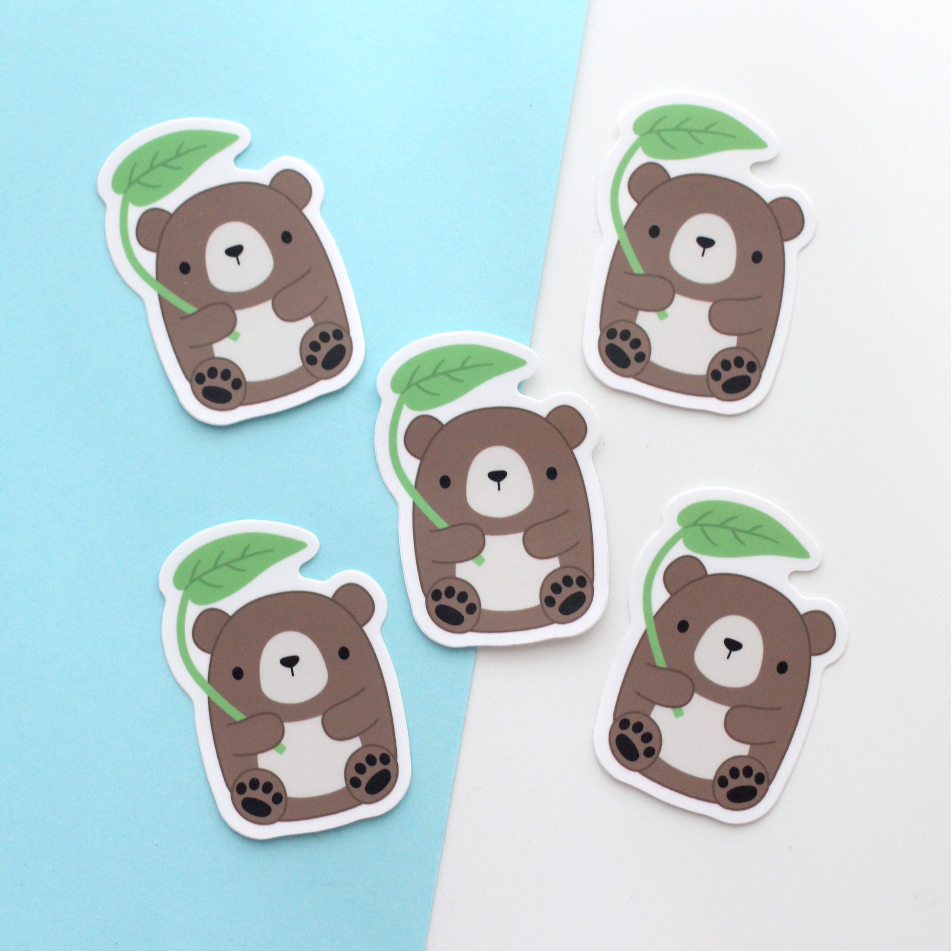 Brown Bear with Leaf Umbrella Vinyl Sticker. Laptop and Phone Decal