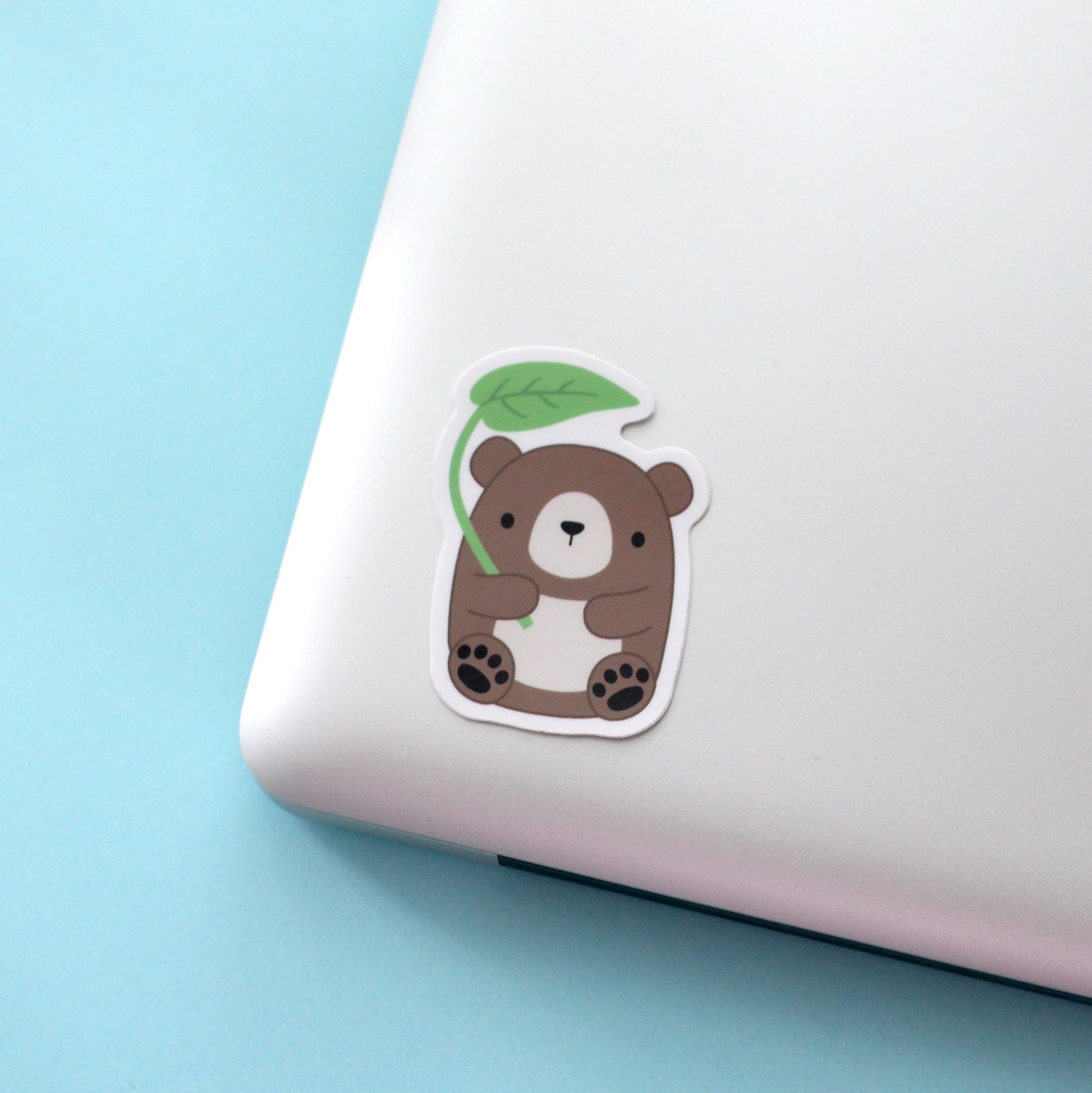 Brown Bear with Leaf Umbrella Vinyl Sticker. Laptop and Phone Decal