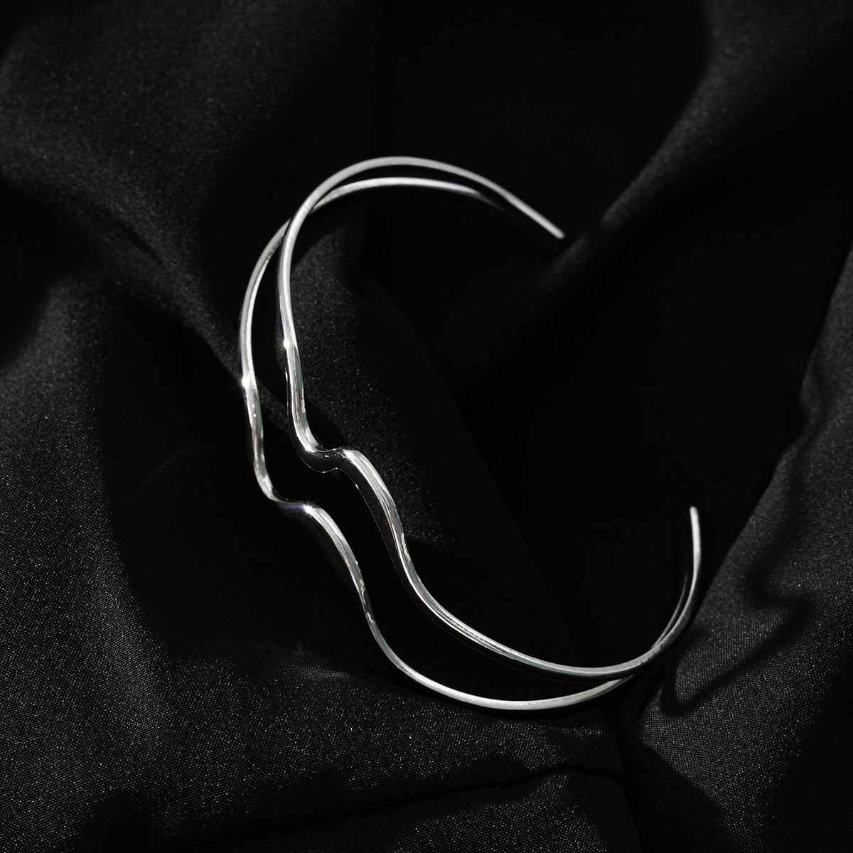 CHITRA: Industrial-Chic Bracelet with Abstract Shaped Parallel Bands in Silver Toned White Gold