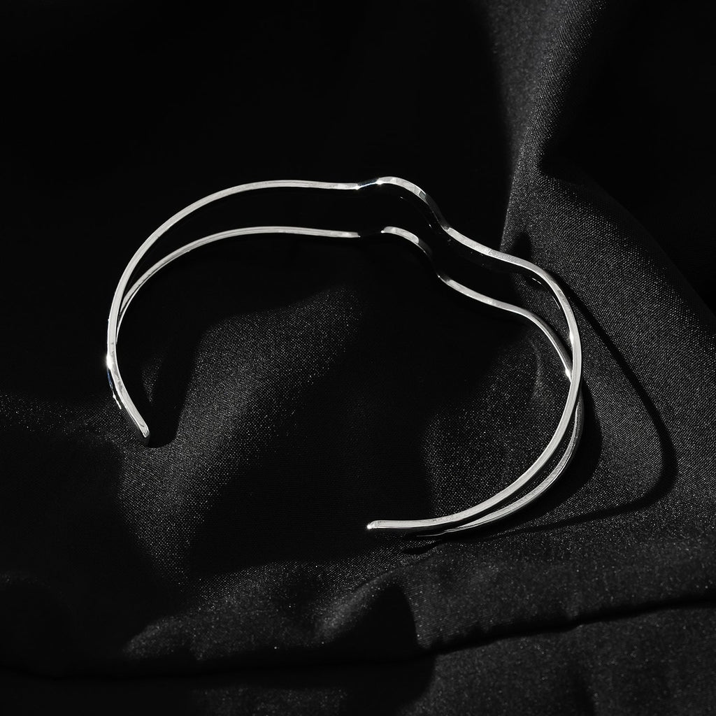 CHITRA: Industrial-Chic Bracelet with Abstract Shaped Parallel Bands in Silver Toned White Gold