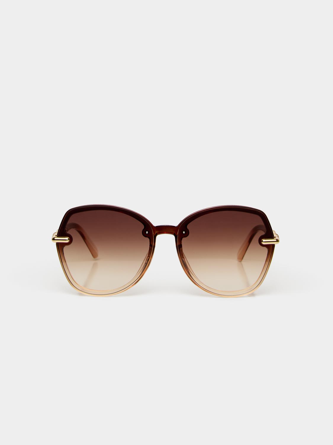 Lunettes de soleil rondes à monture transparente