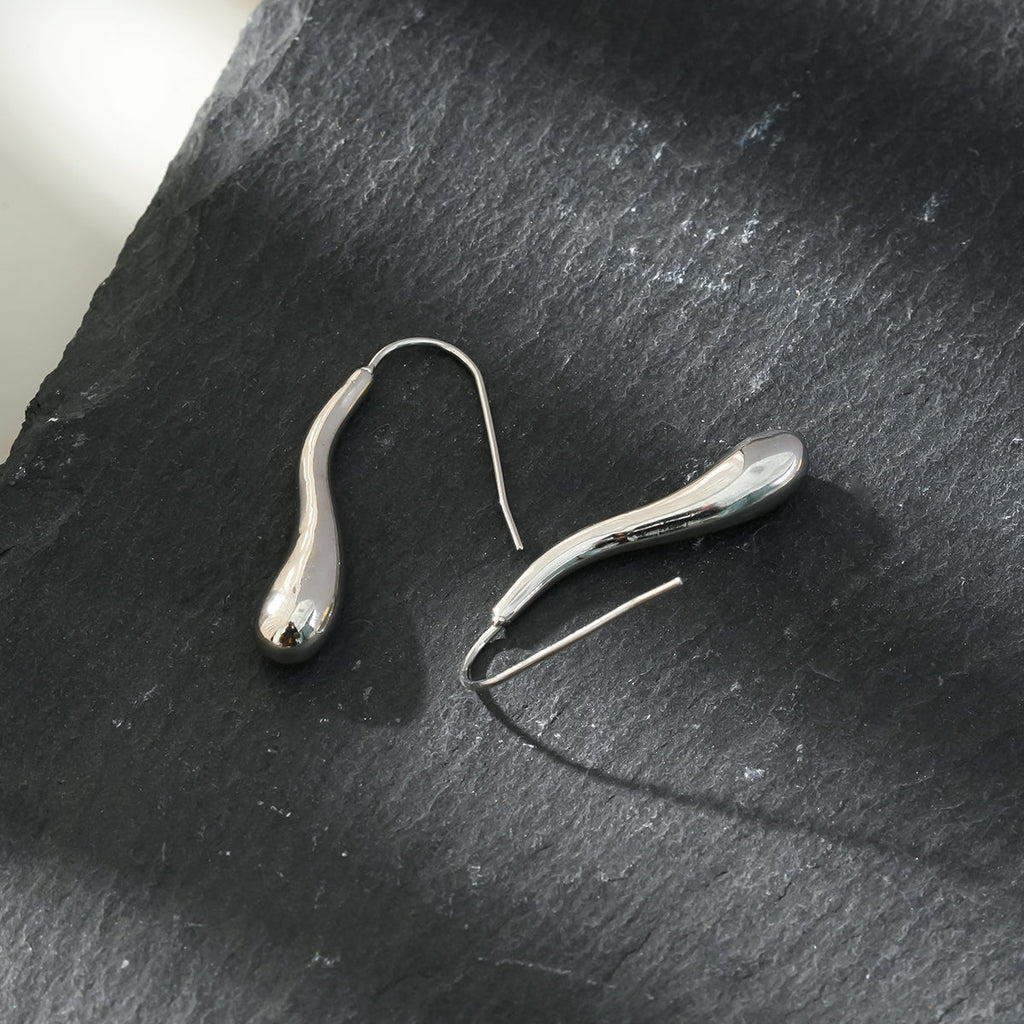 Style CORNING Silver (White Gold): Tadpole-Shaped Earrings – Unique Elegance with a Playful Twist