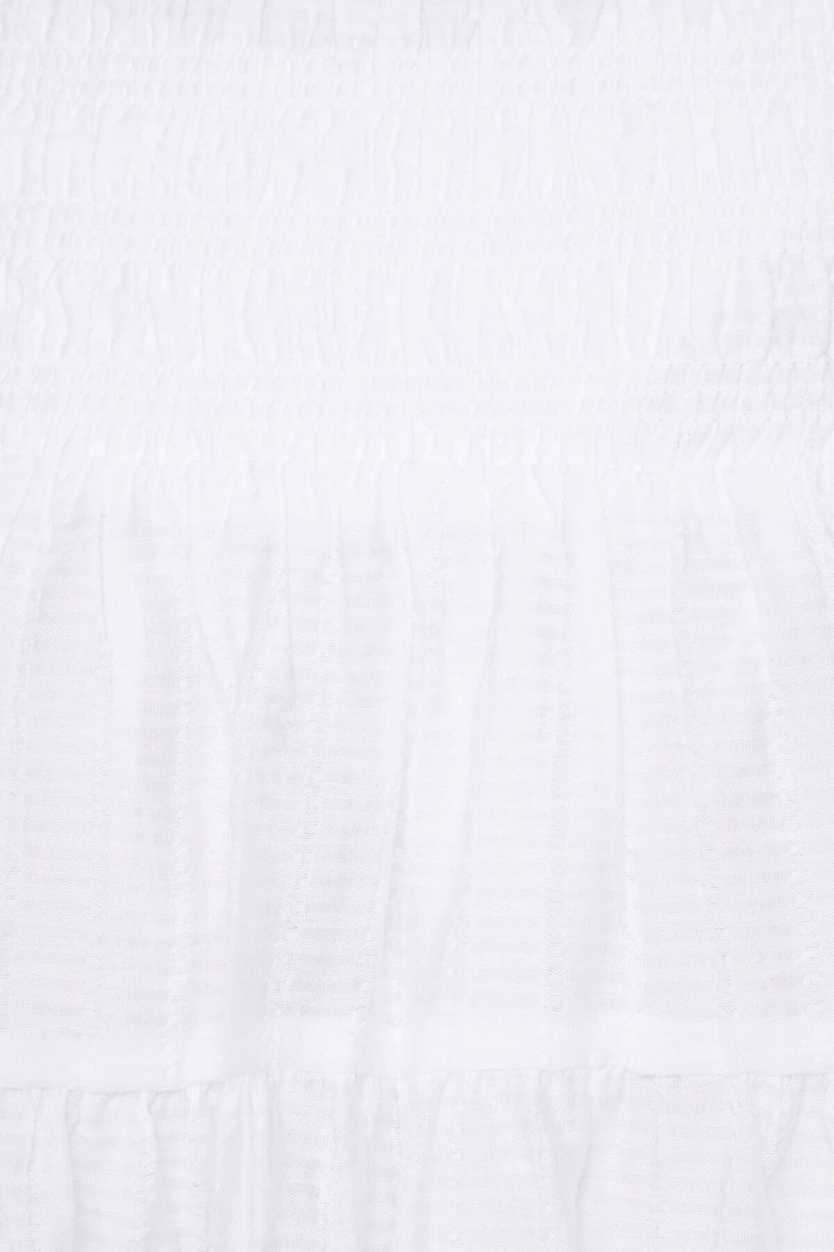 Mini-jupe à smocks Inaya