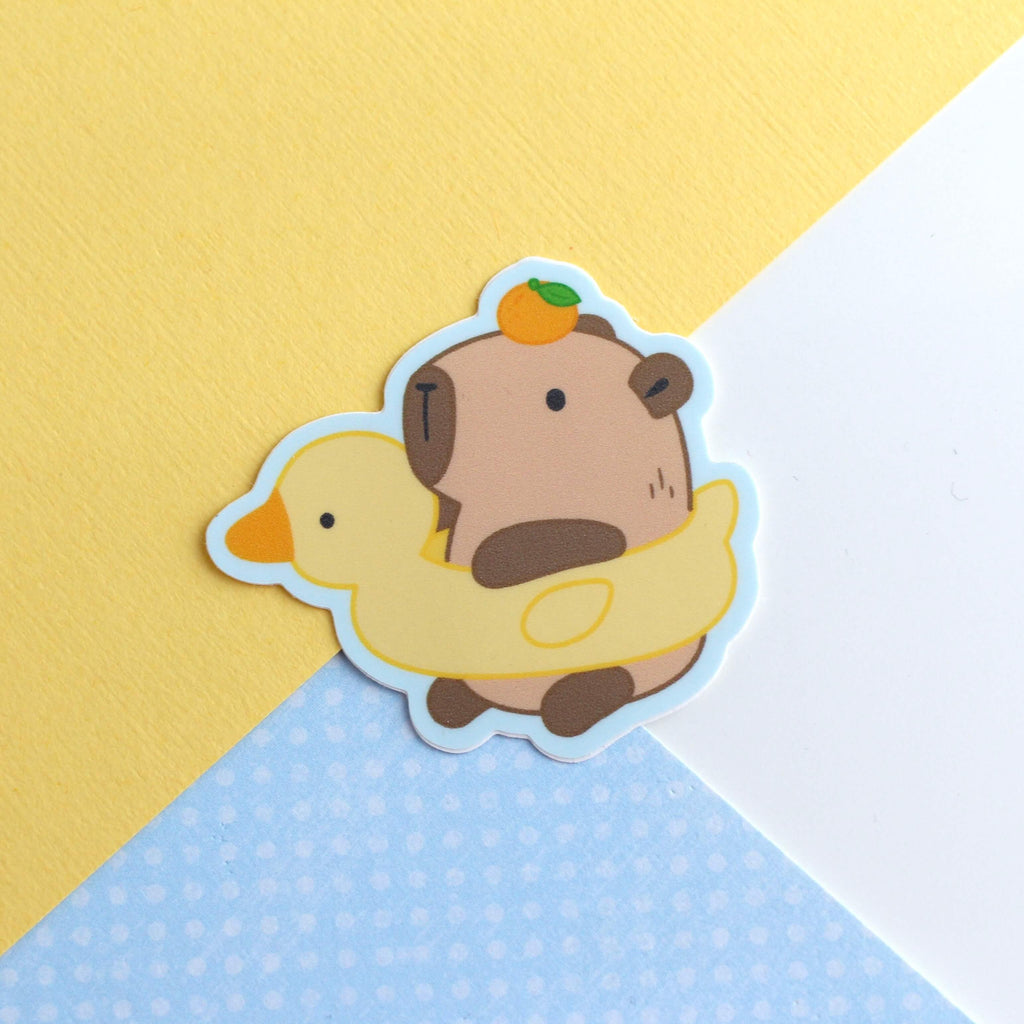 Capybara dans Duck Floatie Autocollant vinyle