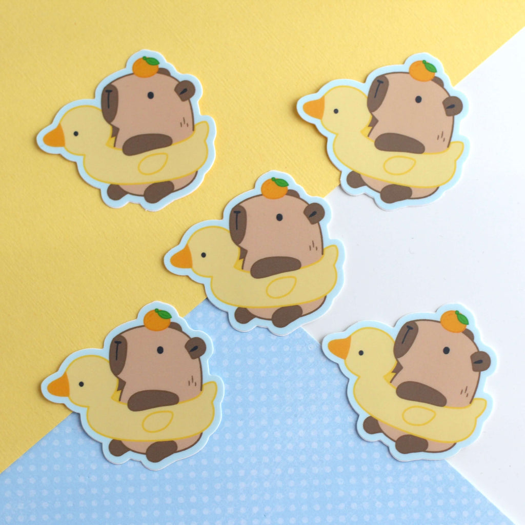 Capybara dans Duck Floatie Autocollant vinyle