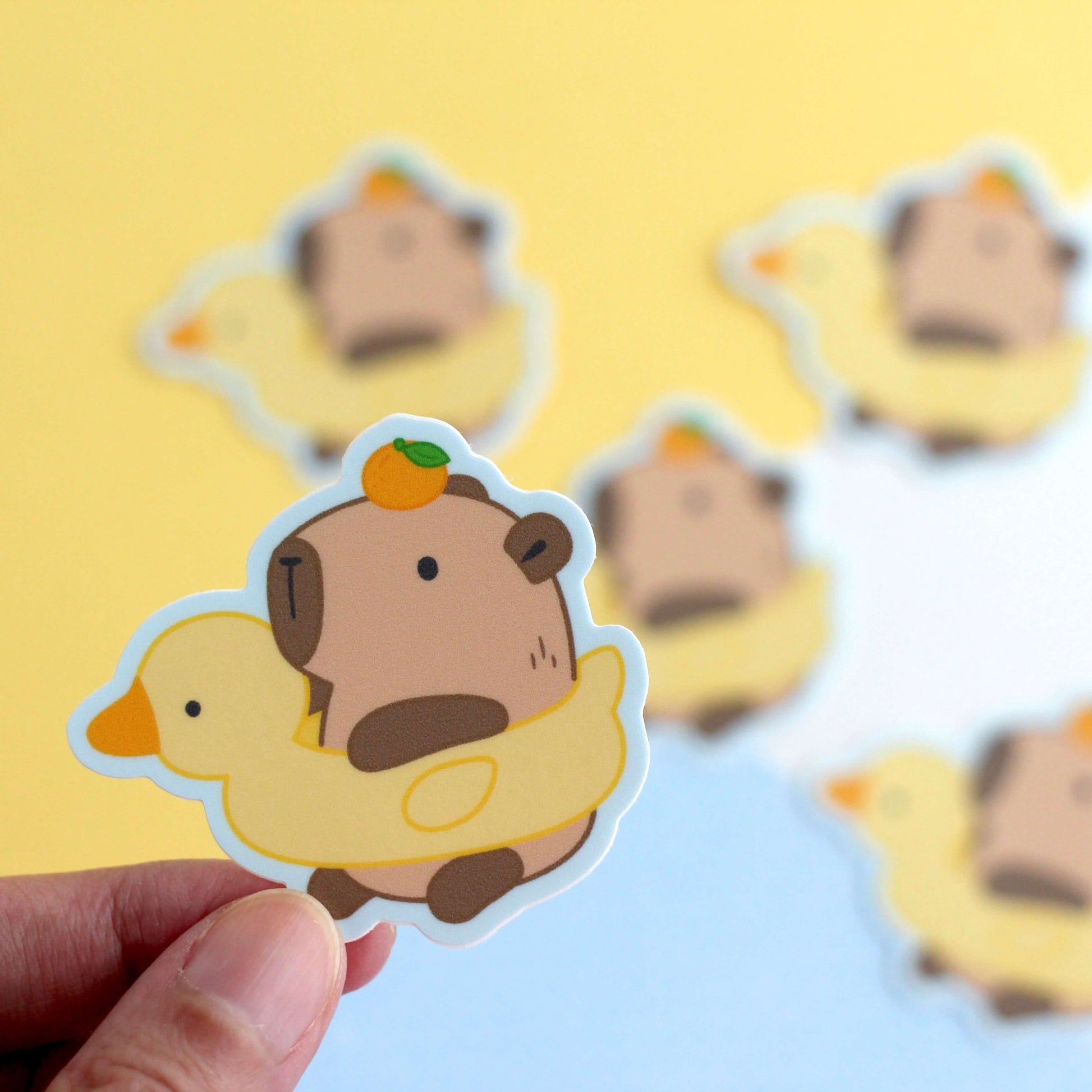 Capybara in Duck Floatie Vinyl Sticker