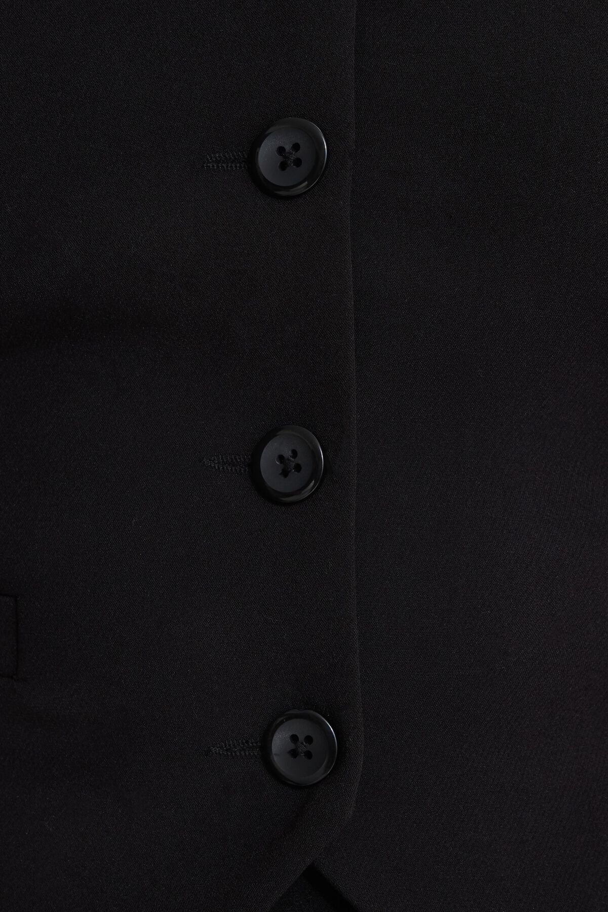 Gilet croisé sur le devant