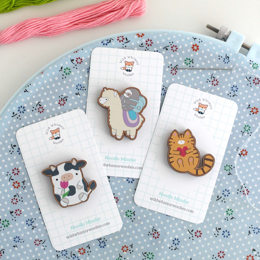 Vache tenant une tulipe, aiguille en bois