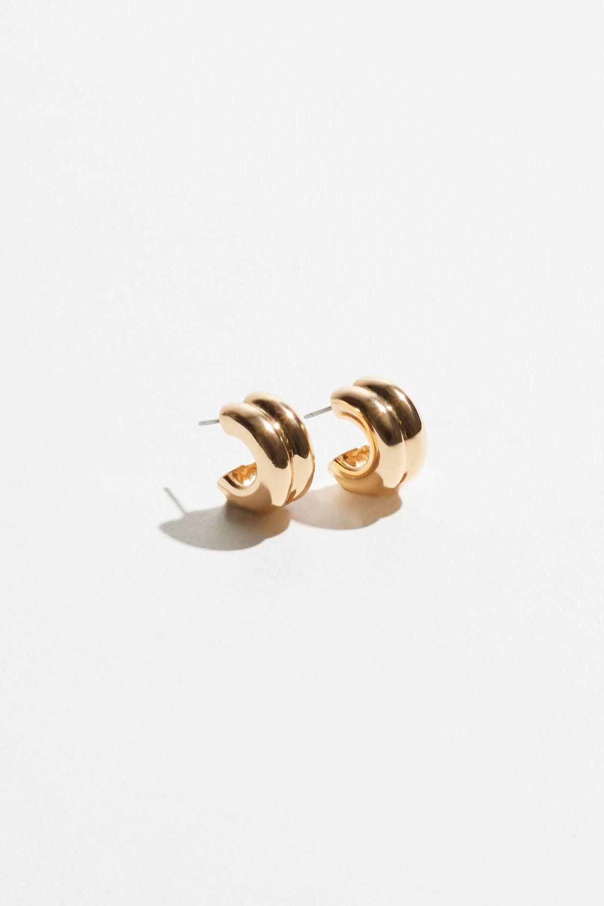 Boucles d'oreilles créoles doubles et potelées